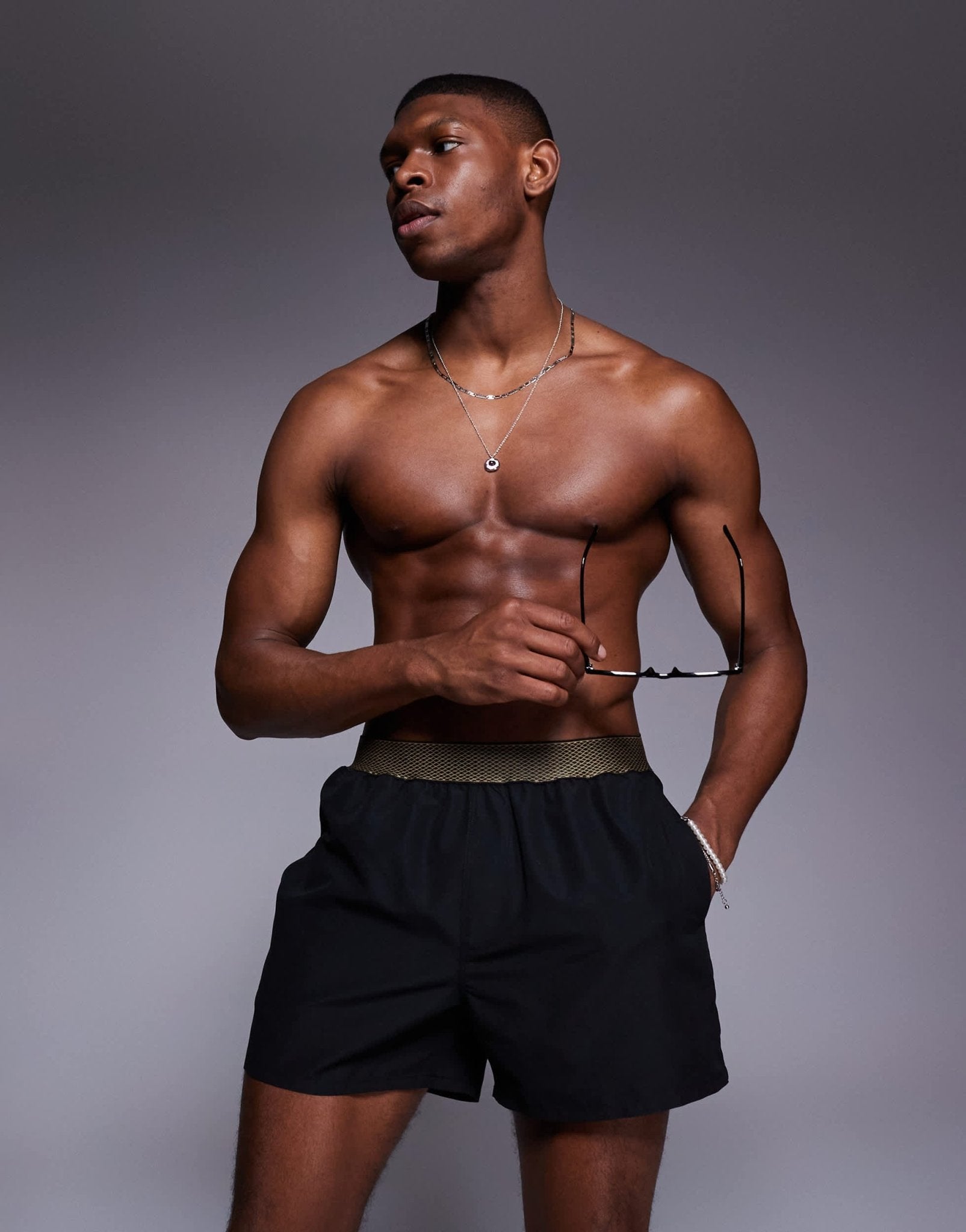 ASOS DESIGN swim shorts in short length with elastic waistband detail in black - ASOS Sample Sale