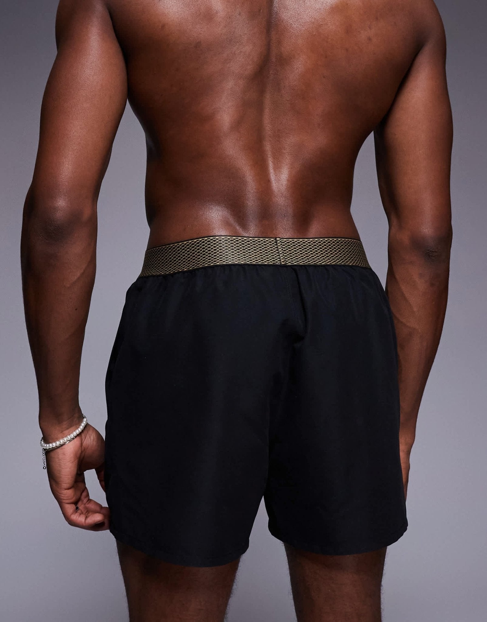ASOS DESIGN swim shorts in short length with elastic waistband detail in black - ASOS Sample Sale