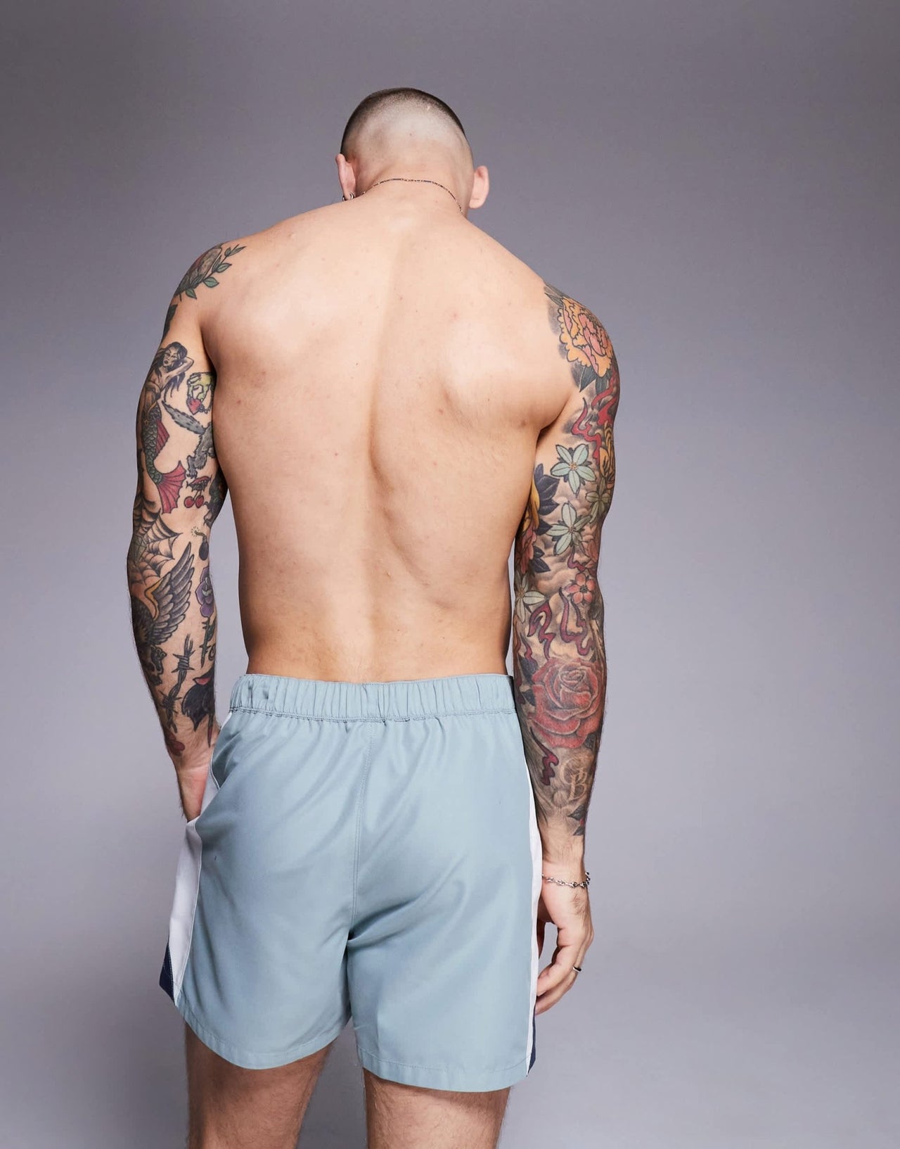 ASOS DESIGN swim shorts in short length with side vent cut and sew in blue - ASOS Sample Sale