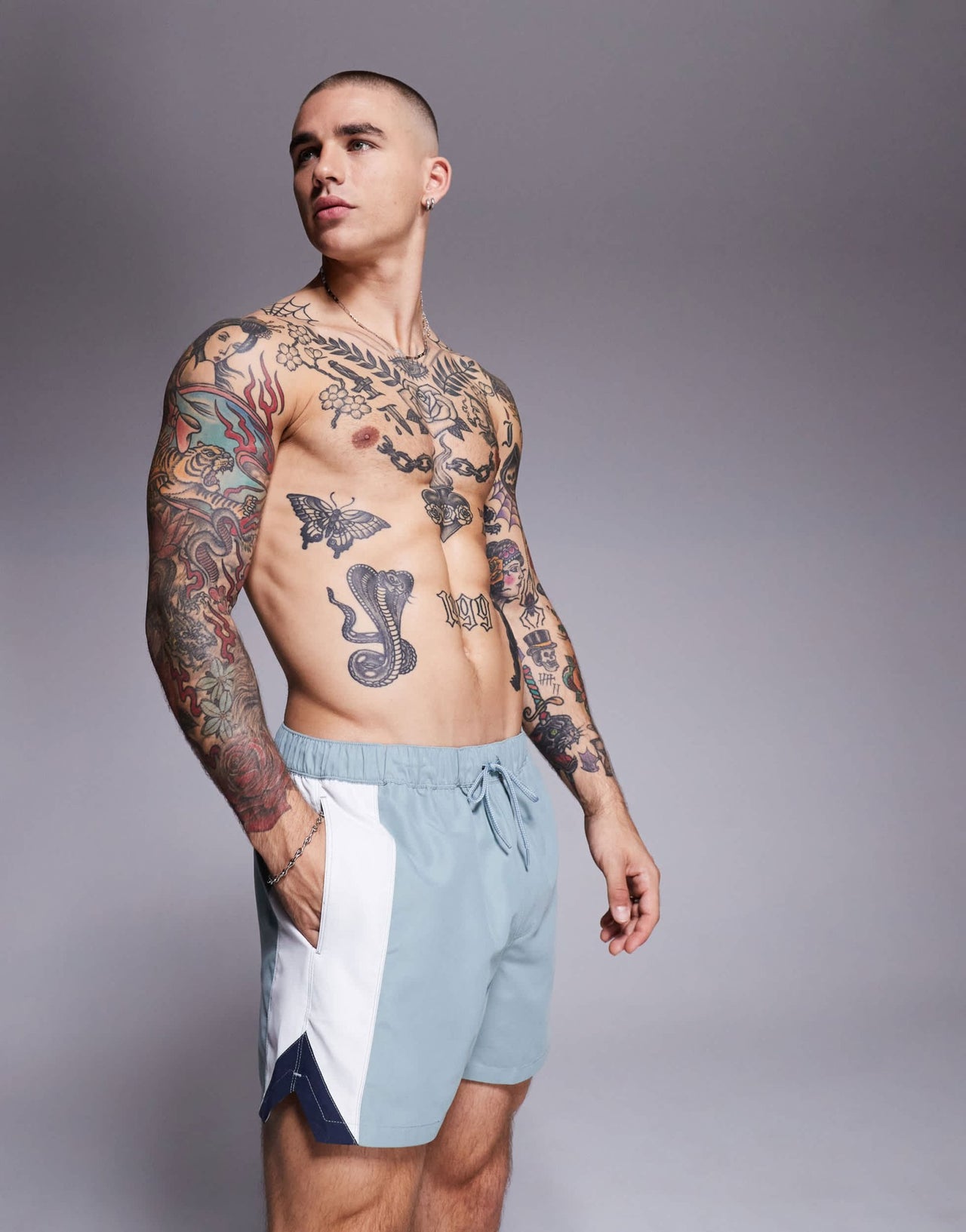 ASOS DESIGN swim shorts in short length with side vent cut and sew in blue - ASOS Sample Sale