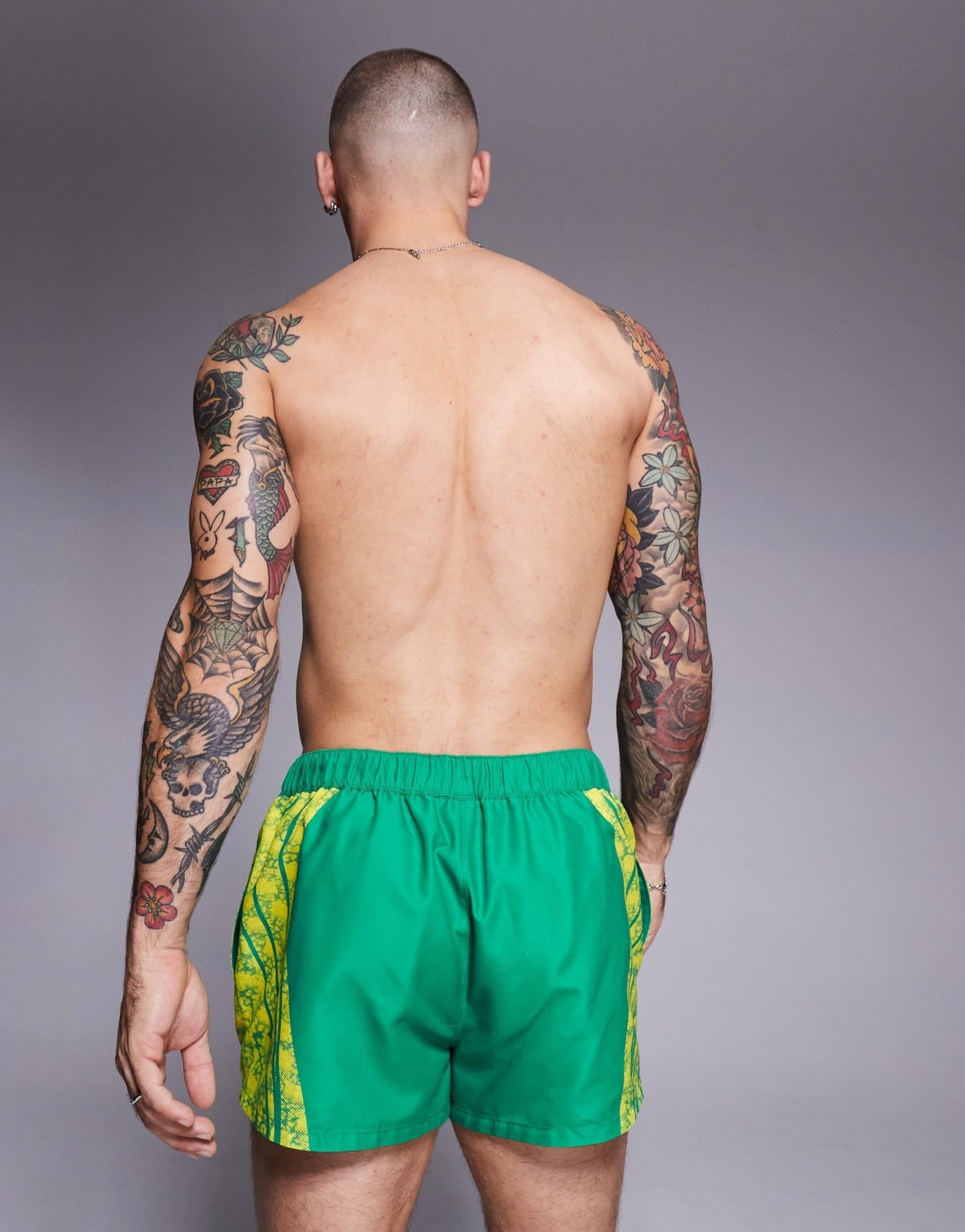 ASOS DESIGN swim shorts in super short length with placement animal print in green - ASOS Sample Sale