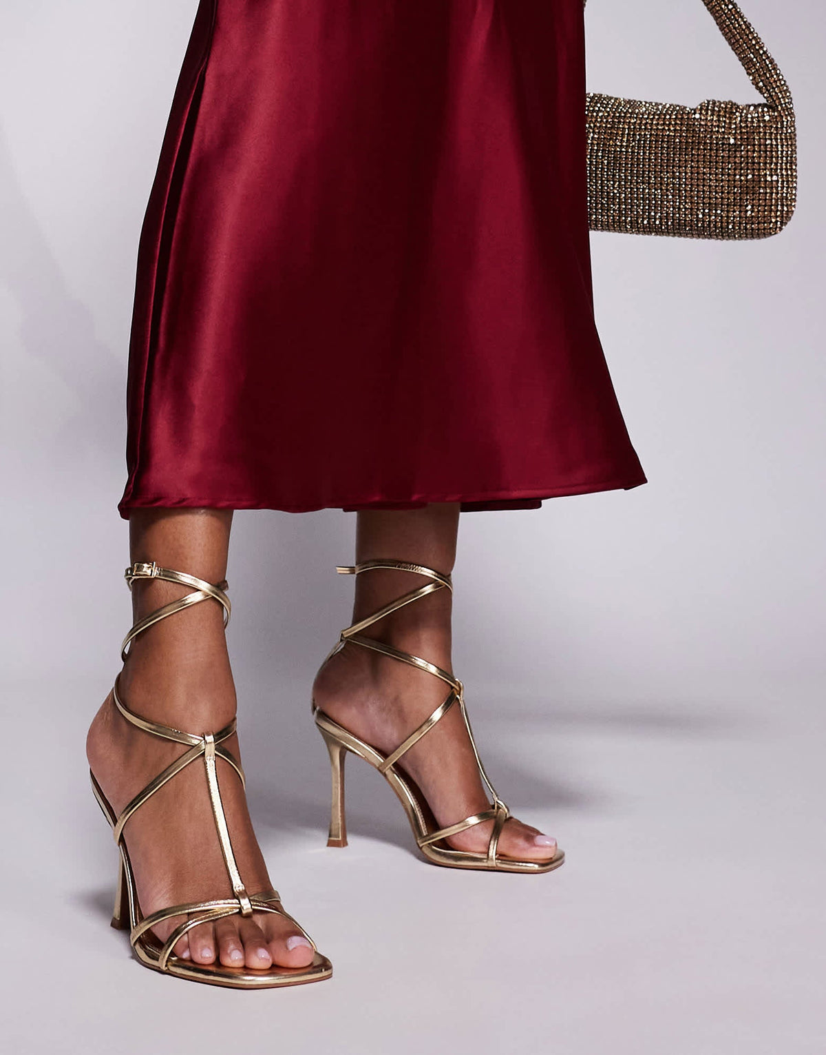 ASOS DESIGN Wide Fit Nobel caged high heeled sandals in gold - ASOS Sample Sale