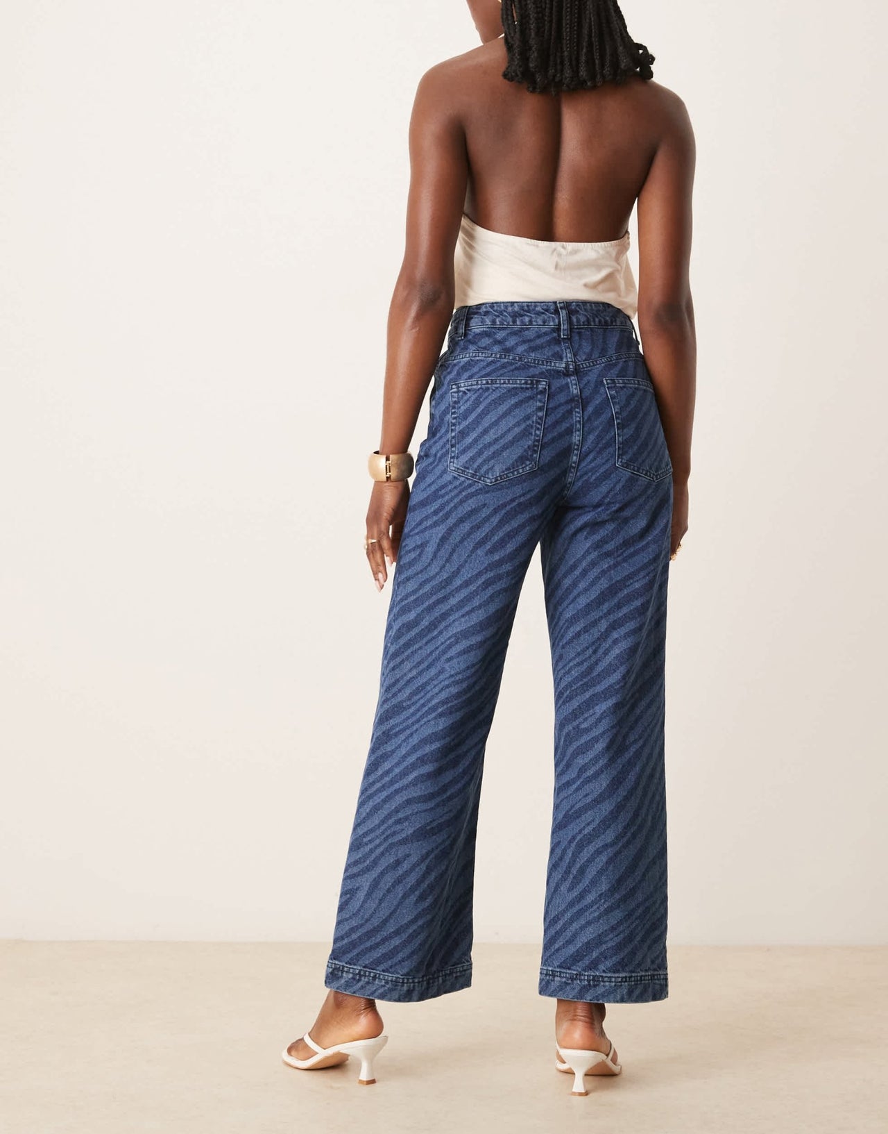 ASOS DESIGN wide leg cropped jean with zebra laser in mid blue - ASOS Sample Sale