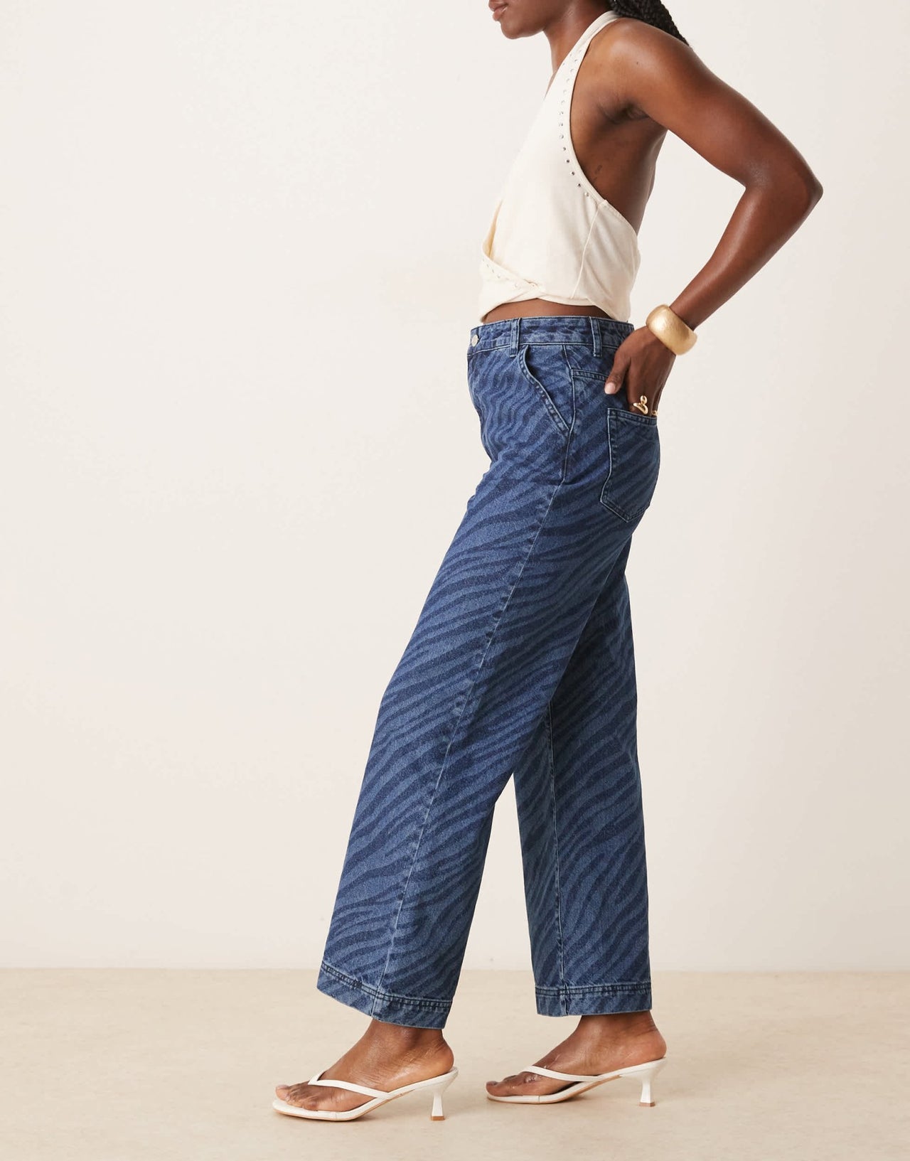 ASOS DESIGN wide leg cropped jean with zebra laser in mid blue - ASOS Sample Sale