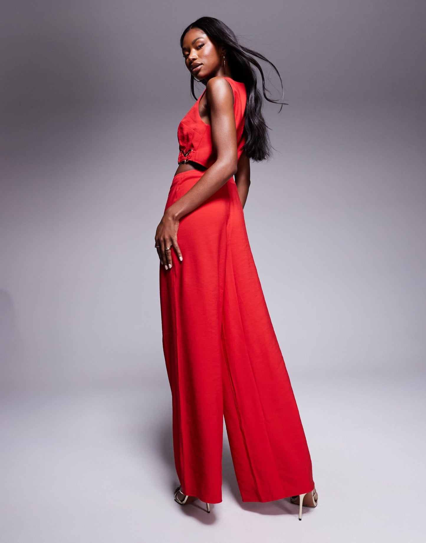 ASOS DESIGN wrap front cut out jumpsuit with buckle detail in red - ASOS Sample Sale