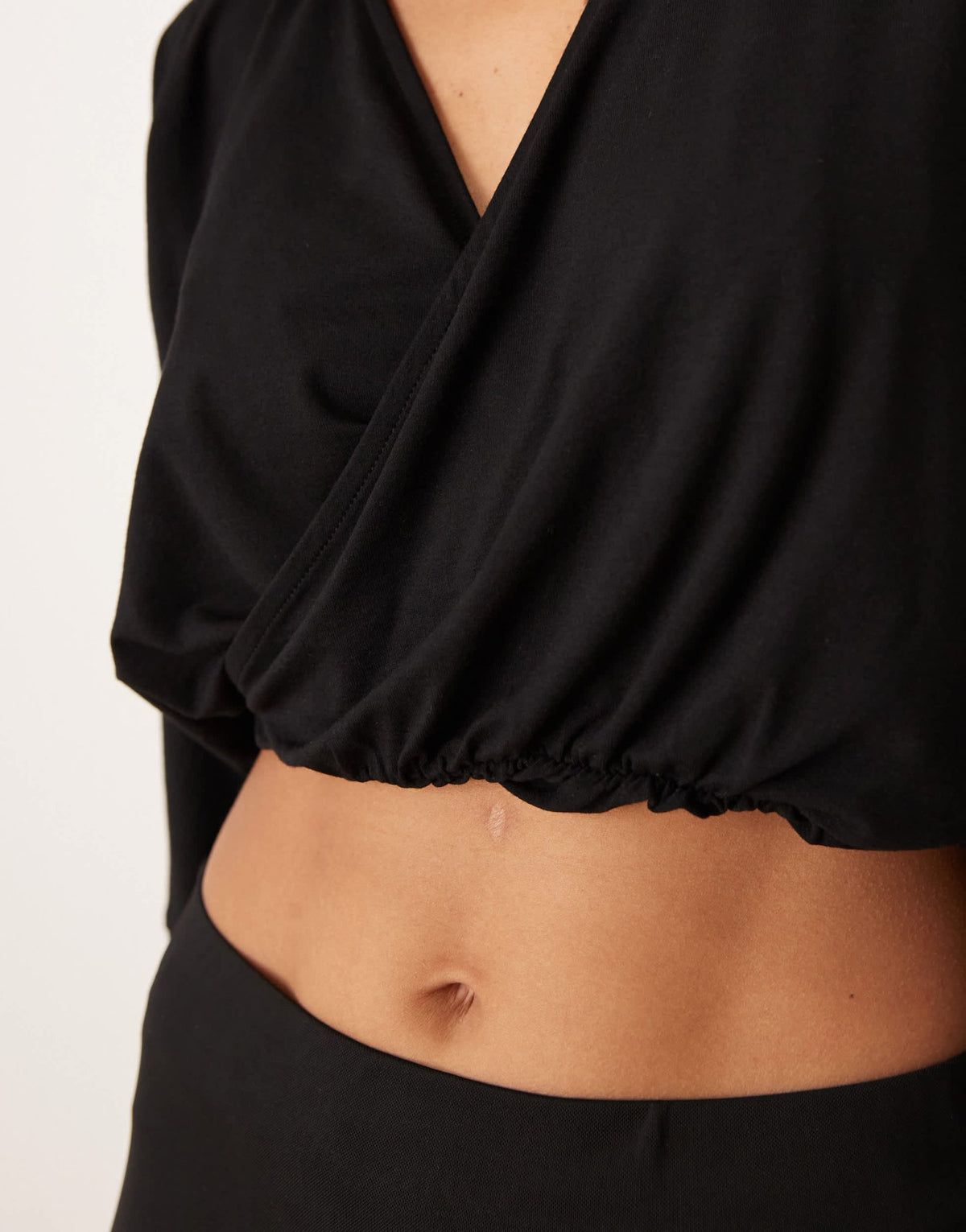 ASOS DESIGN wrap front long sleeve batwing top in black - ASOS Sample Sale