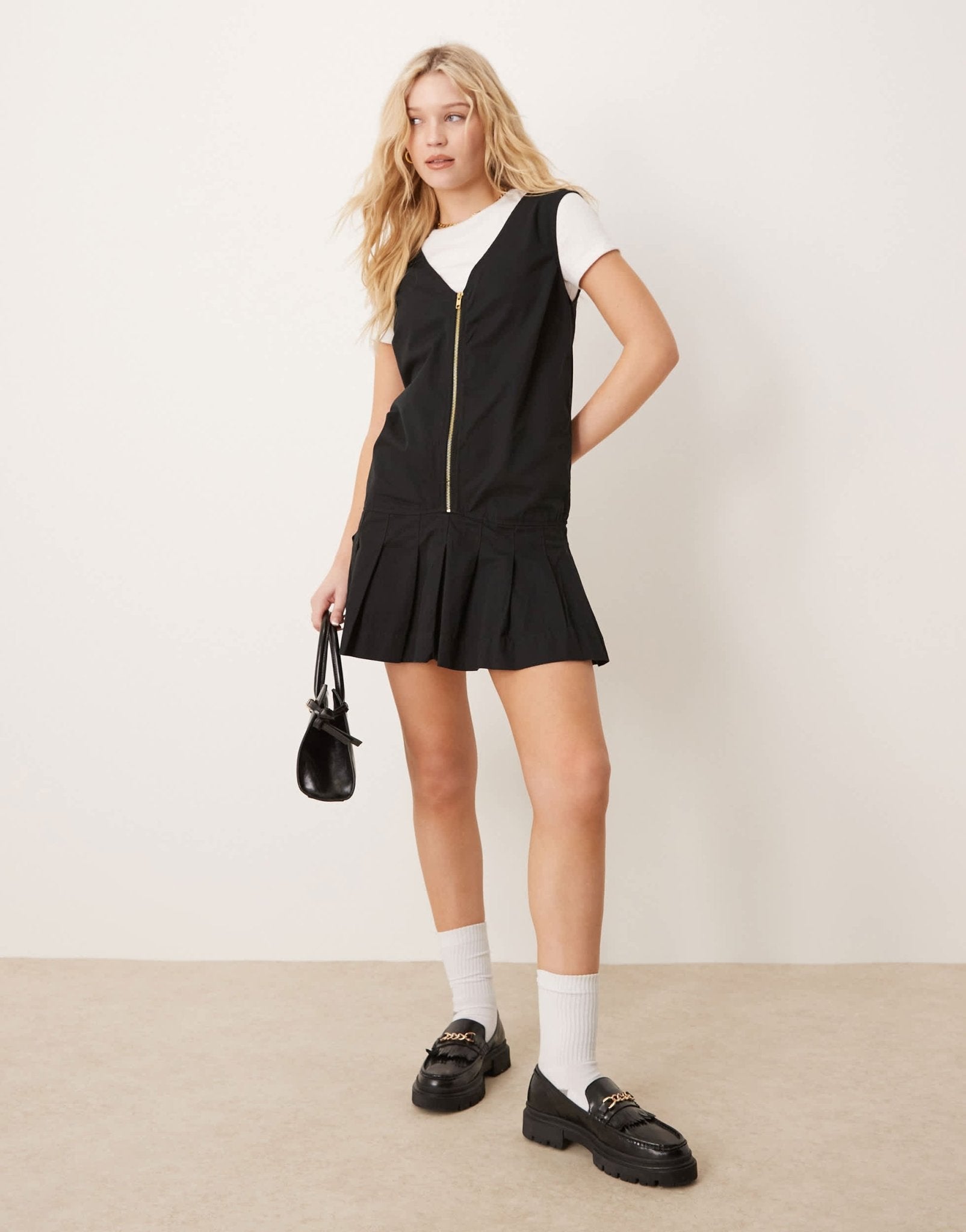 ASOS DESIGN zip through mini twill pinny dress with pleated skirt in black - ASOS Sample Sale