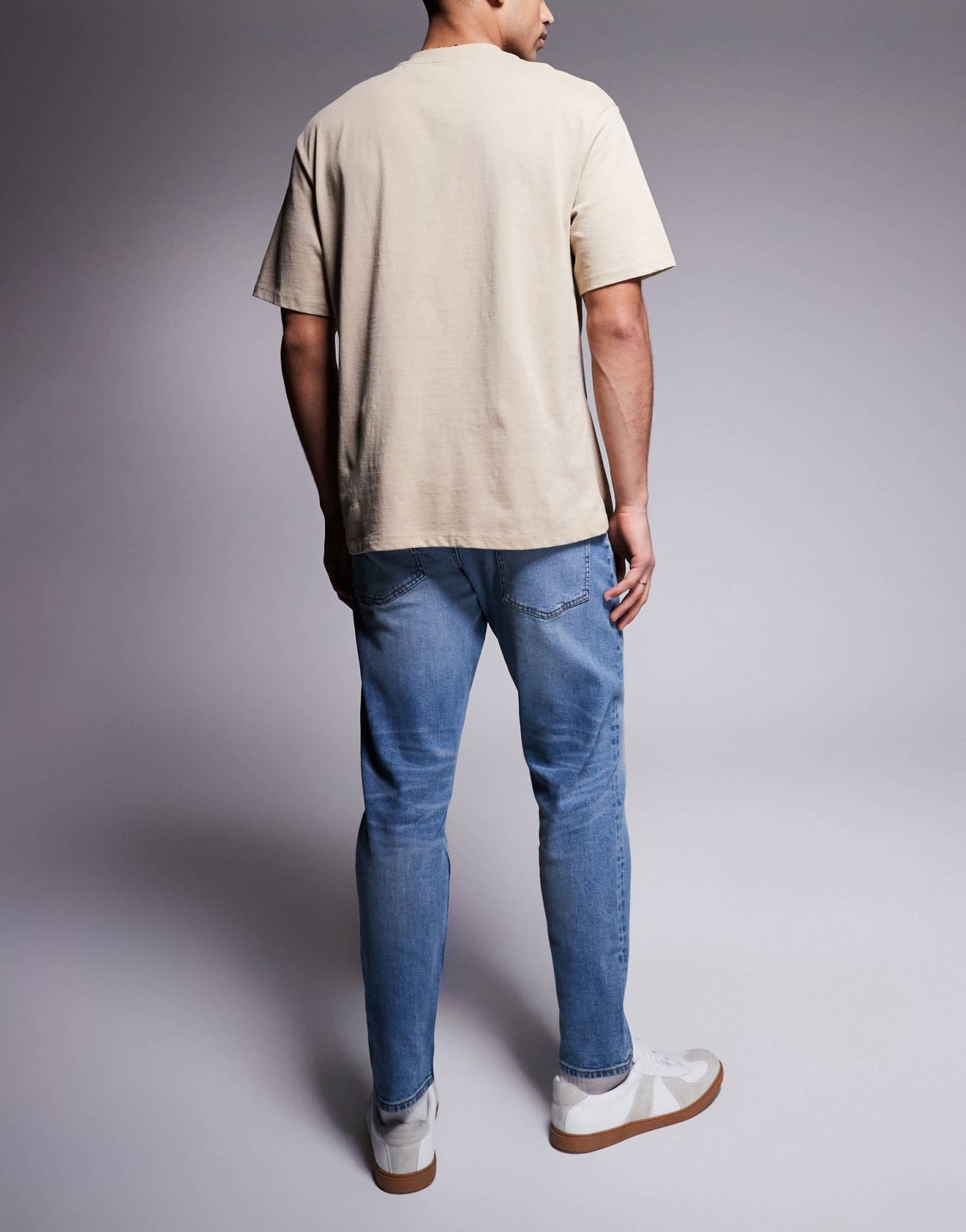 ASOS DSIGN stretch tapered jeans in mid wash with vintage tint - ASOS Sample Sale