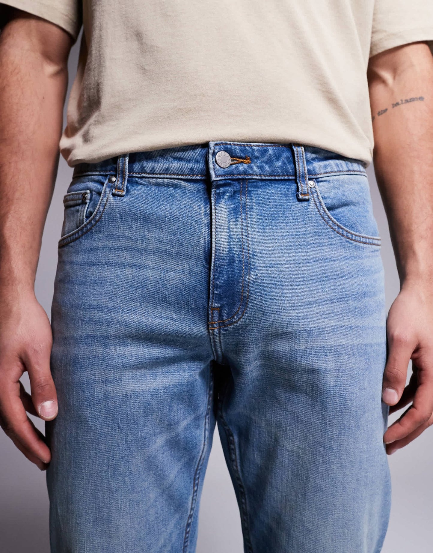 ASOS DSIGN stretch tapered jeans in mid wash with vintage tint - ASOS Sample Sale