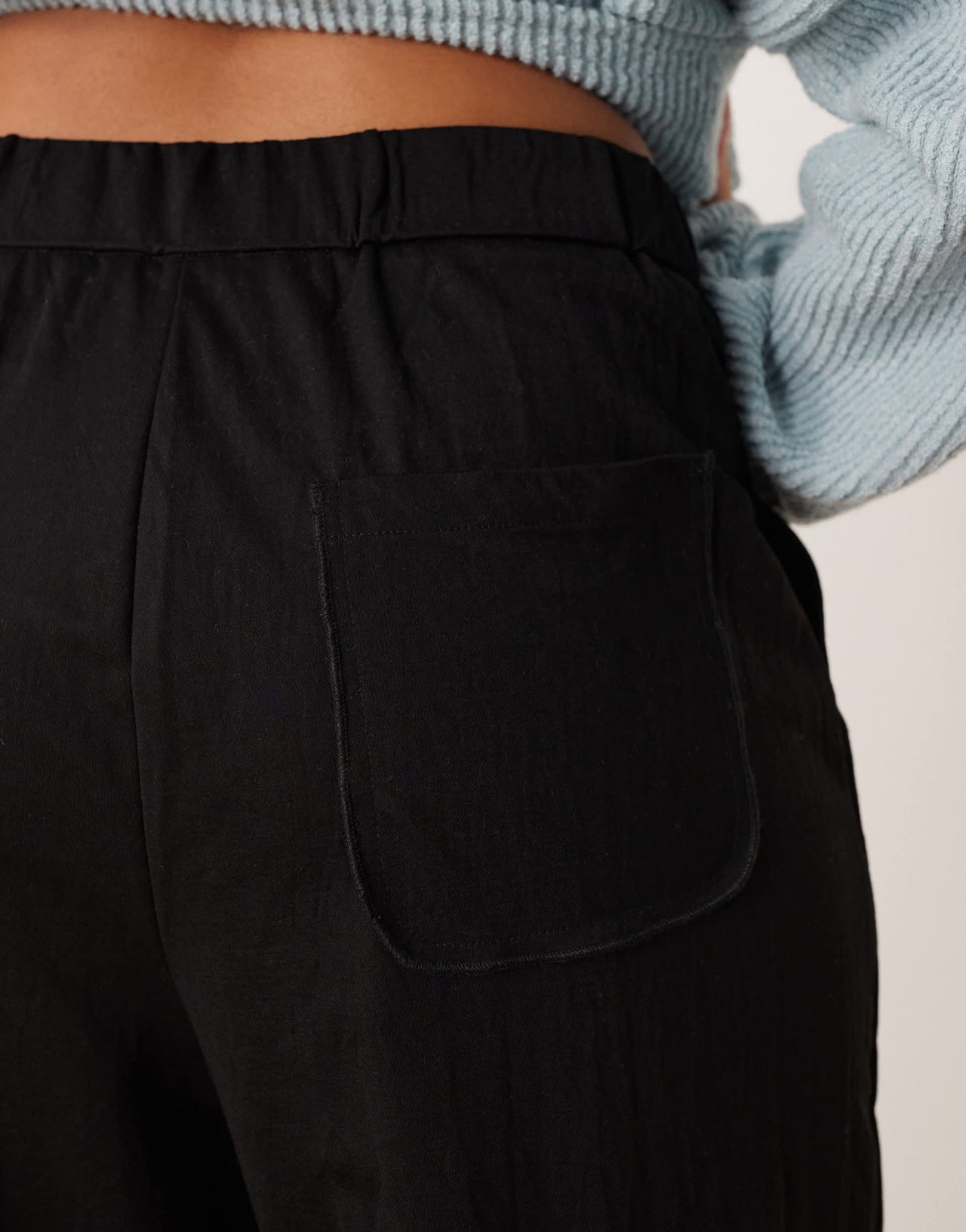 AWARE pleat front wide leg trousers in black - ASOS Sample Sale