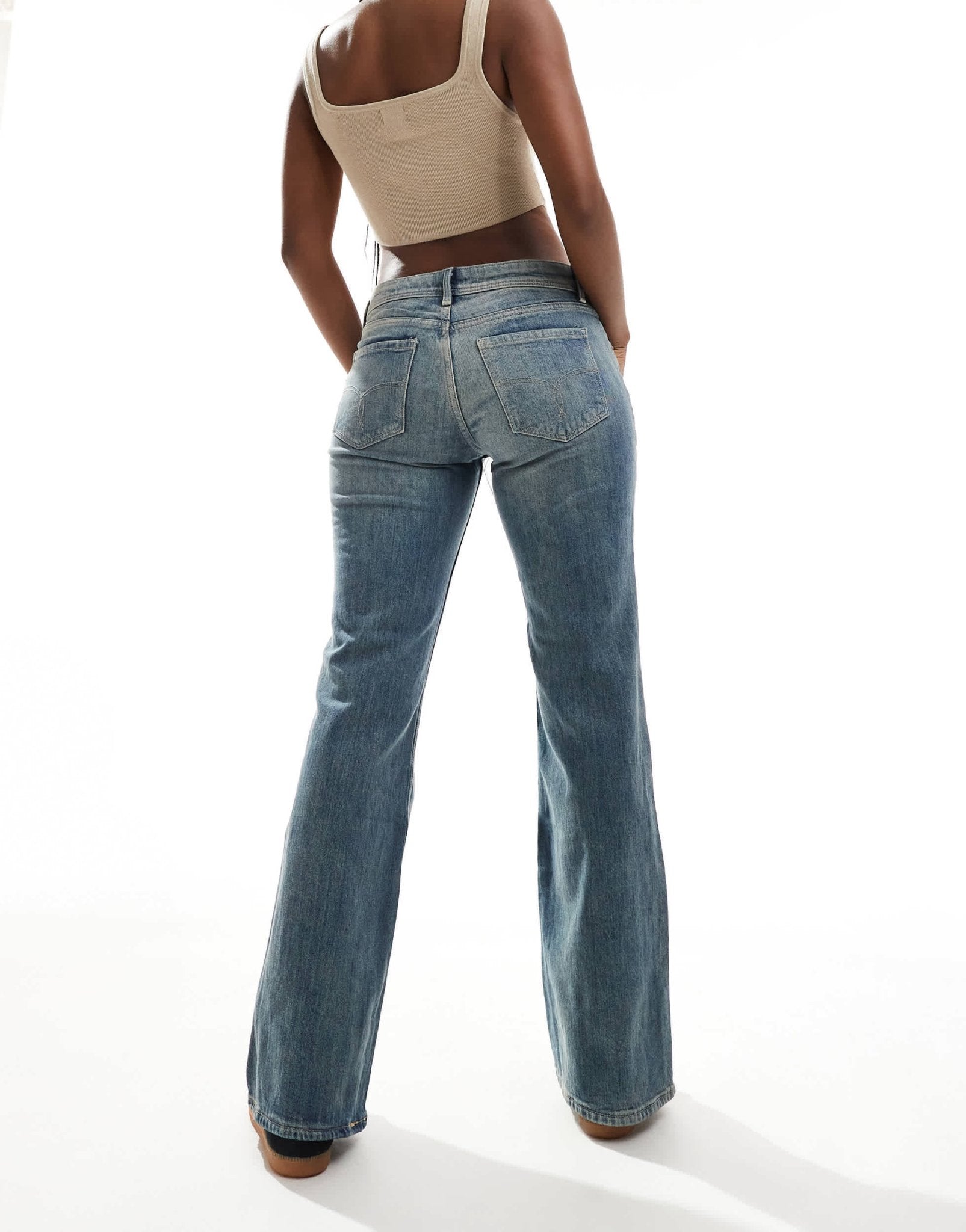 Bershka low rise flared jeans in mid wash blue - ASOS Sample Sale