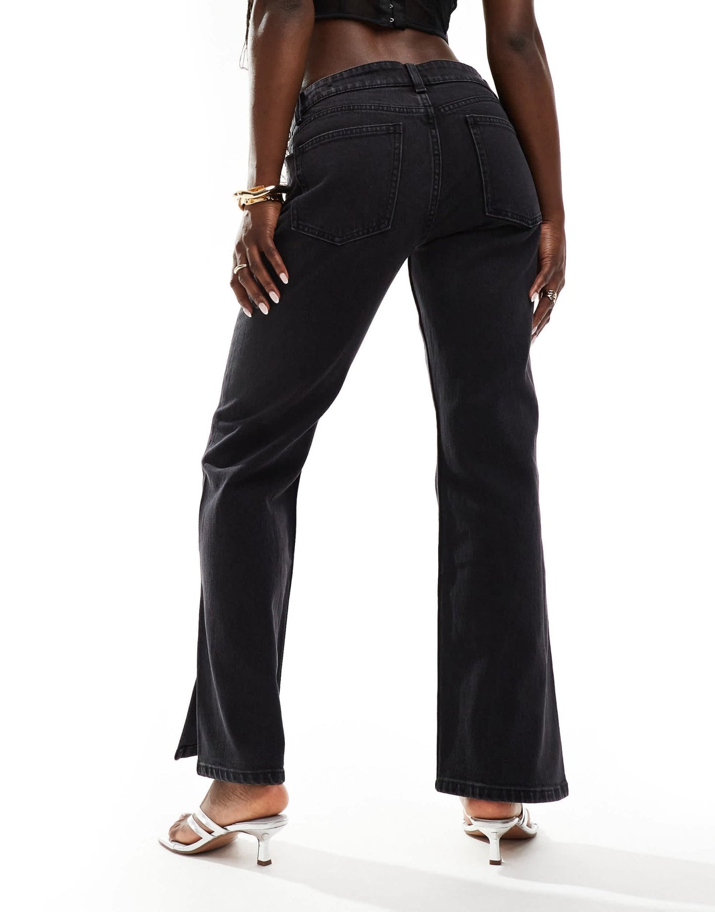 Bershka split hem flare jean in black - ASOS Sample Sale