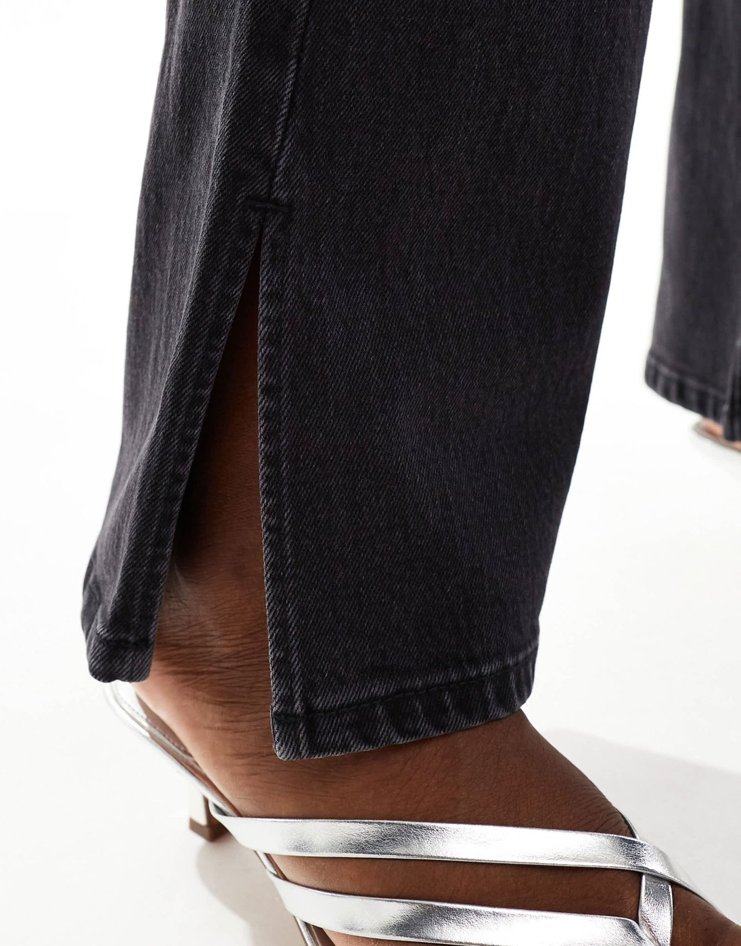 Bershka split hem flare jean in black - ASOS Sample Sale