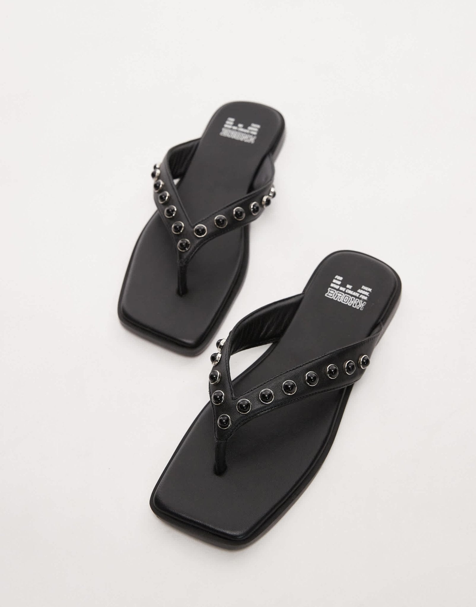 Bronx Cassan - dra beaded flip flop sandals in black leather - ASOS Sample Sale