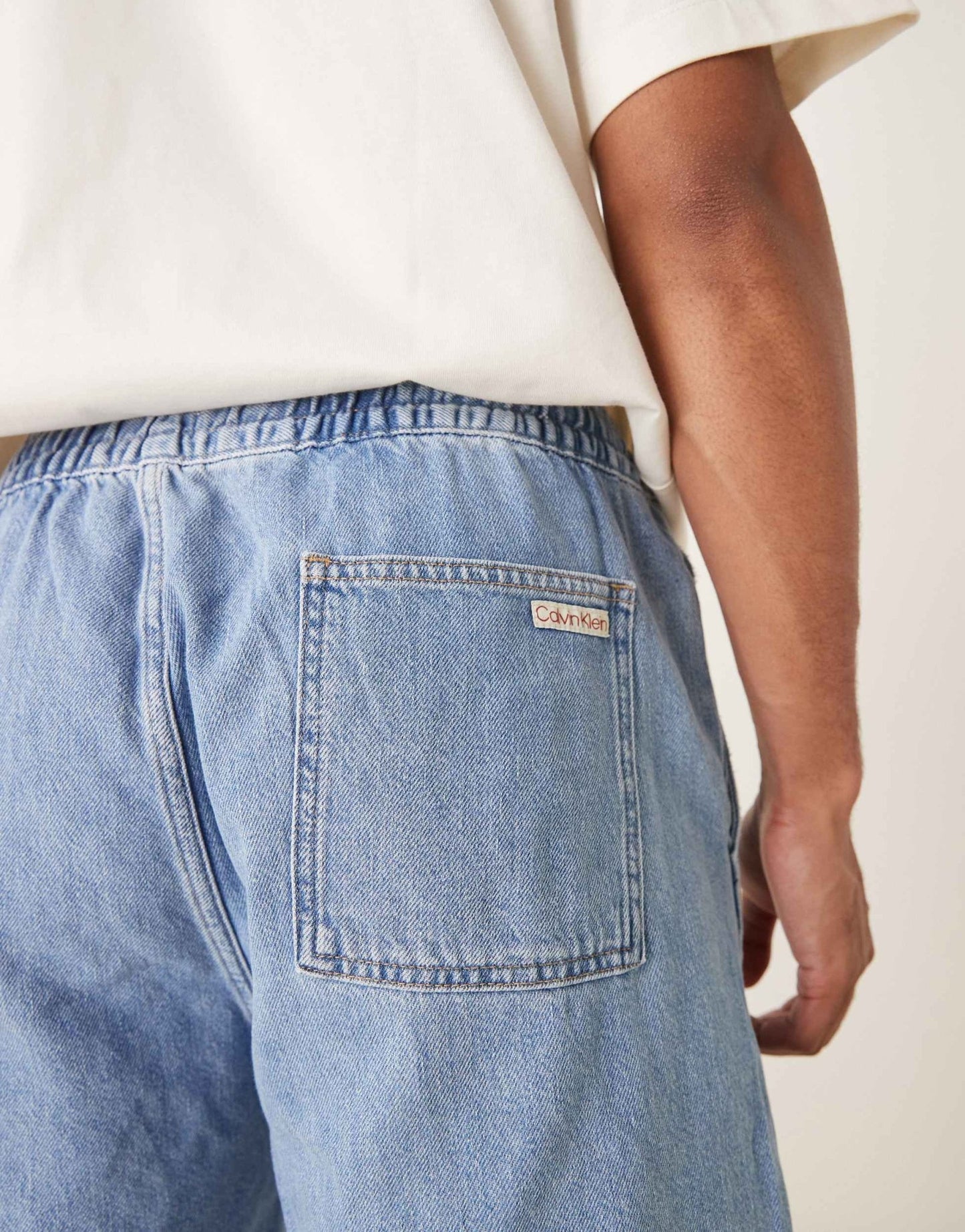 Calvin Klein Jeans relaxed pull on shorts in light blue wash - ASOS Sample Sale