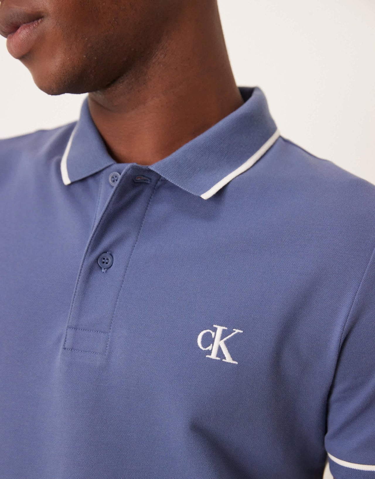 Calvin Klein Jeans tipped polo in washed blue - ASOS Sample Sale