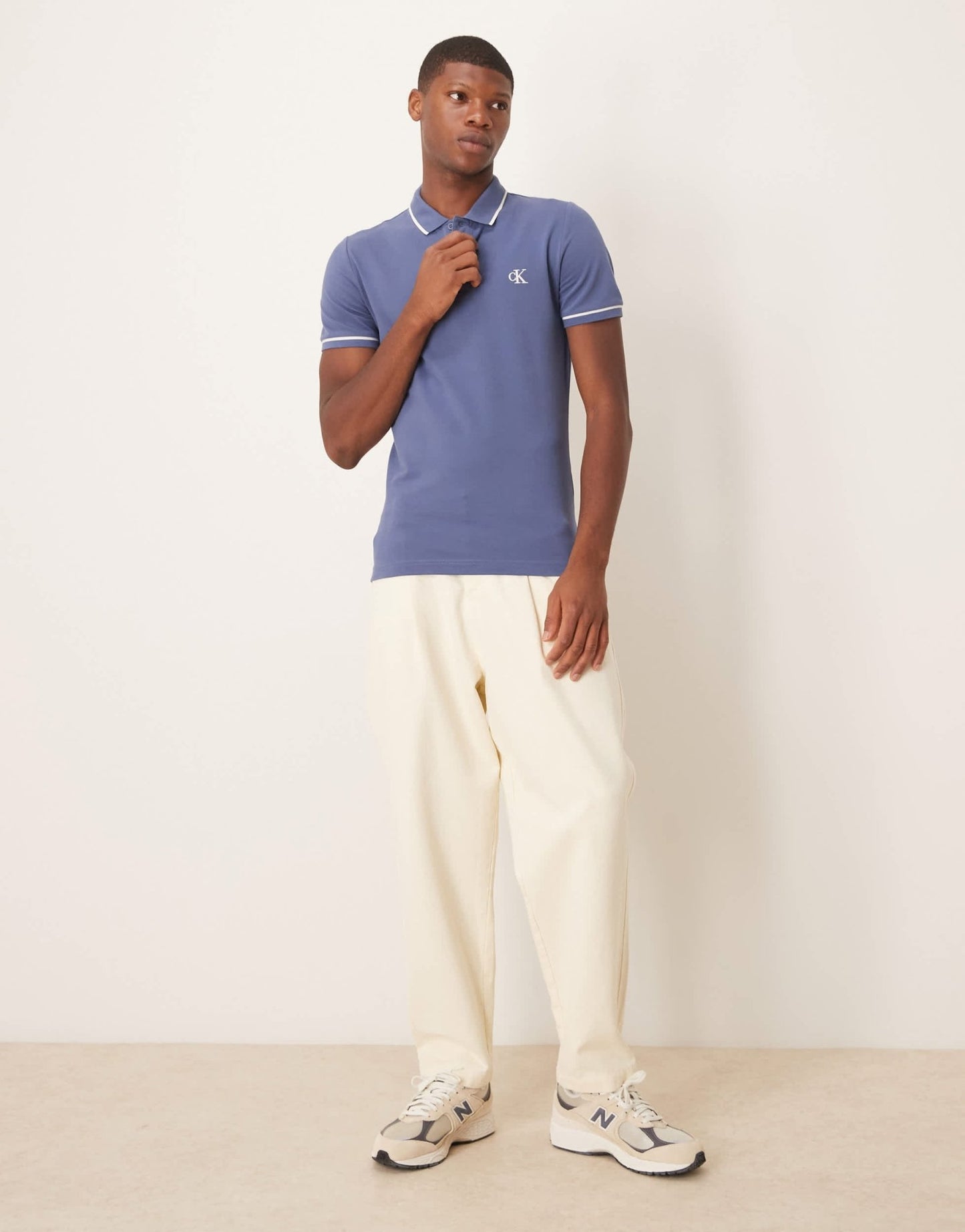 Calvin Klein Jeans tipped polo in washed blue - ASOS Sample Sale