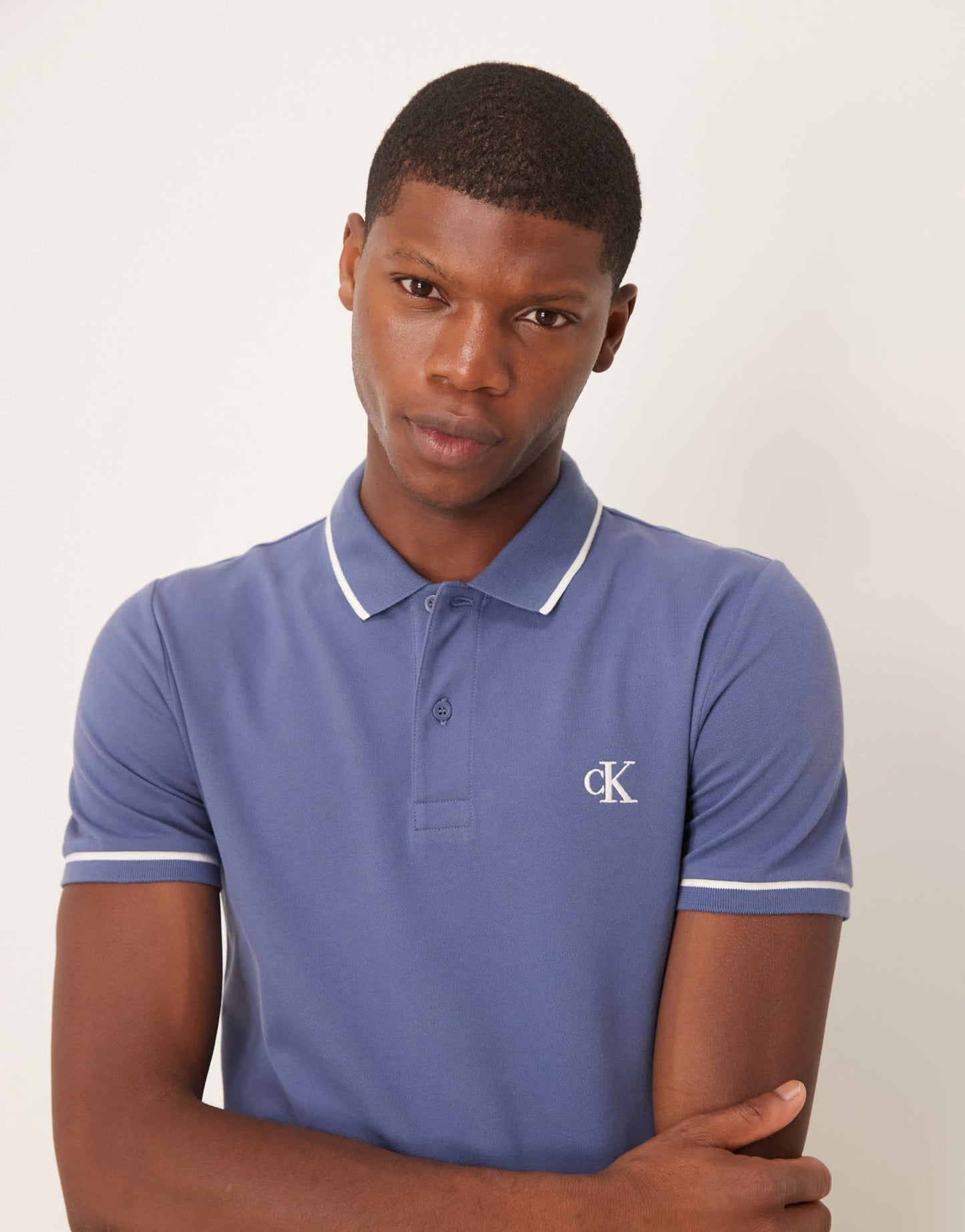 Calvin Klein Jeans tipped polo in washed blue - ASOS Sample Sale