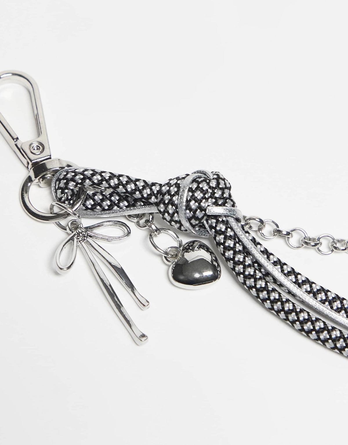 DesignB London bungee cord and heart bag charm in black and white polka dot - ASOS Sample Sale