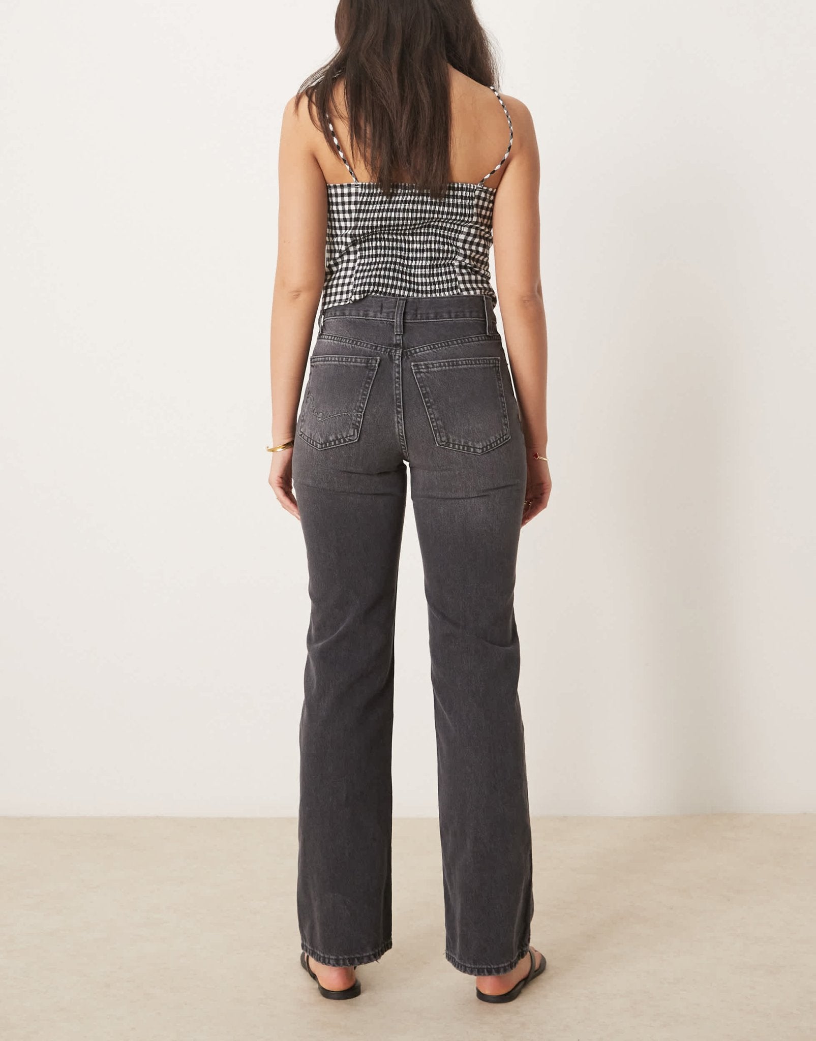 Free People holly bootcut knee jeans in washed black - ASOS Sample Sale