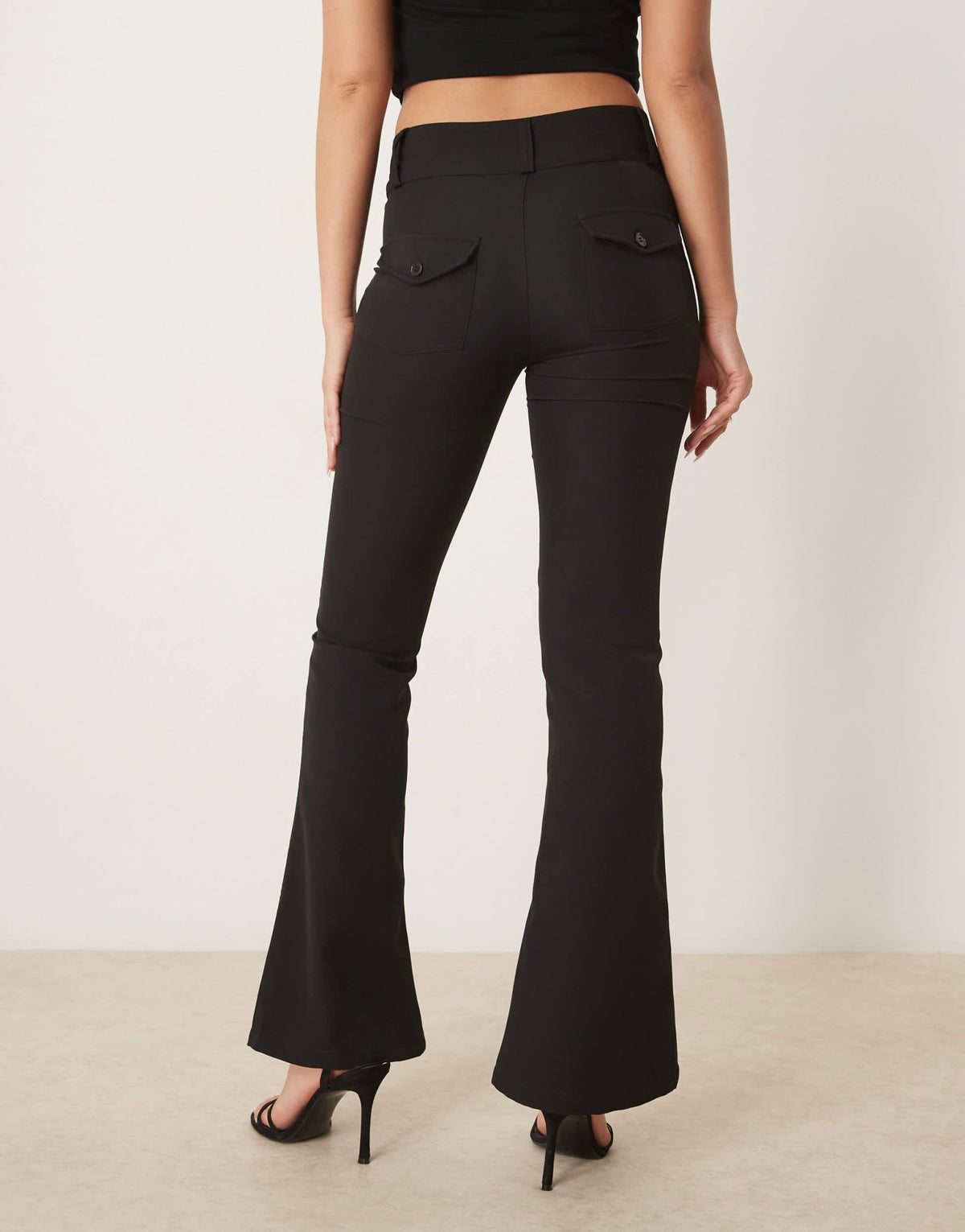 Gina Tricot low rise flare leg stretch trousers in black - ASOS Sample Sale
