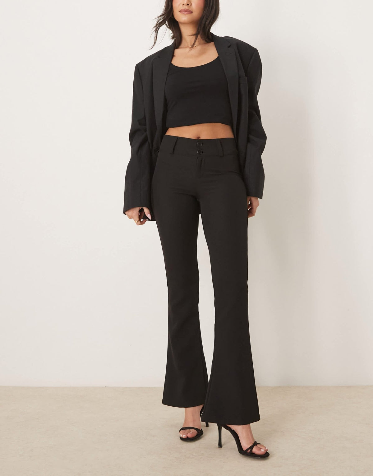 Gina Tricot low rise flare leg stretch trousers in black - ASOS Sample Sale