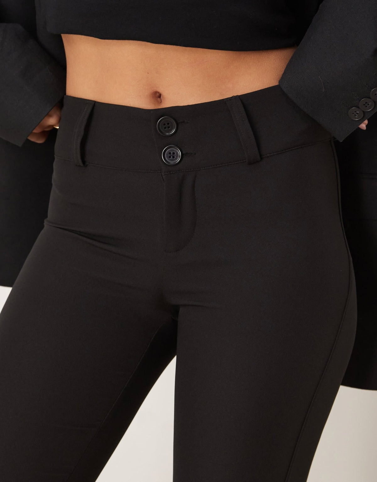 Gina Tricot low rise flare leg stretch trousers in black - ASOS Sample Sale