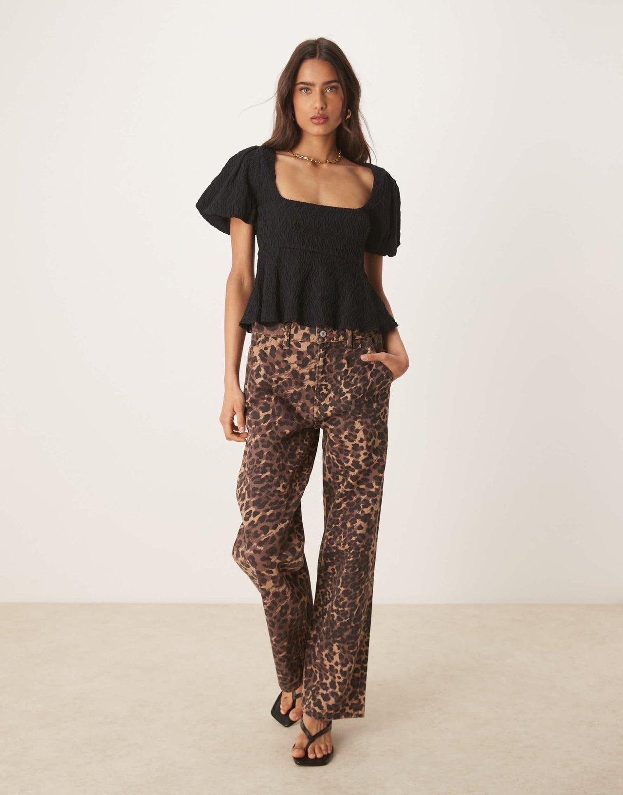 Gina Tricot wavy textured jersey with puff sleeves and peplum hem in black - ASOS Sample Sale