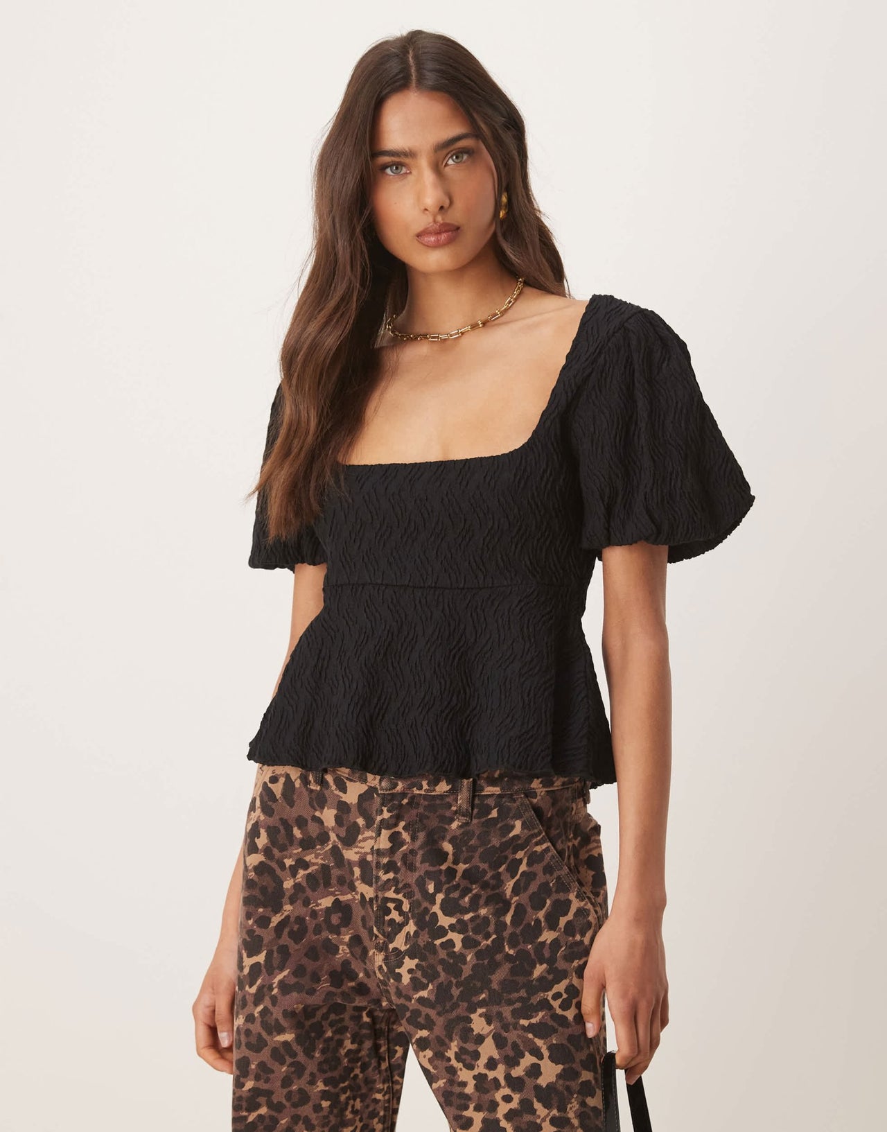 Gina Tricot wavy textured jersey with puff sleeves and peplum hem in black - ASOS Sample Sale