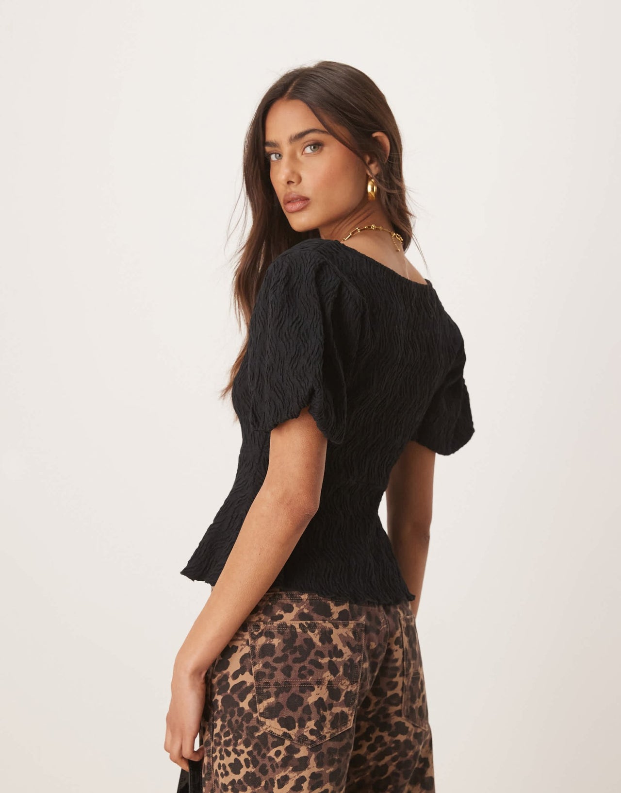 Gina Tricot wavy textured jersey with puff sleeves and peplum hem in black - ASOS Sample Sale