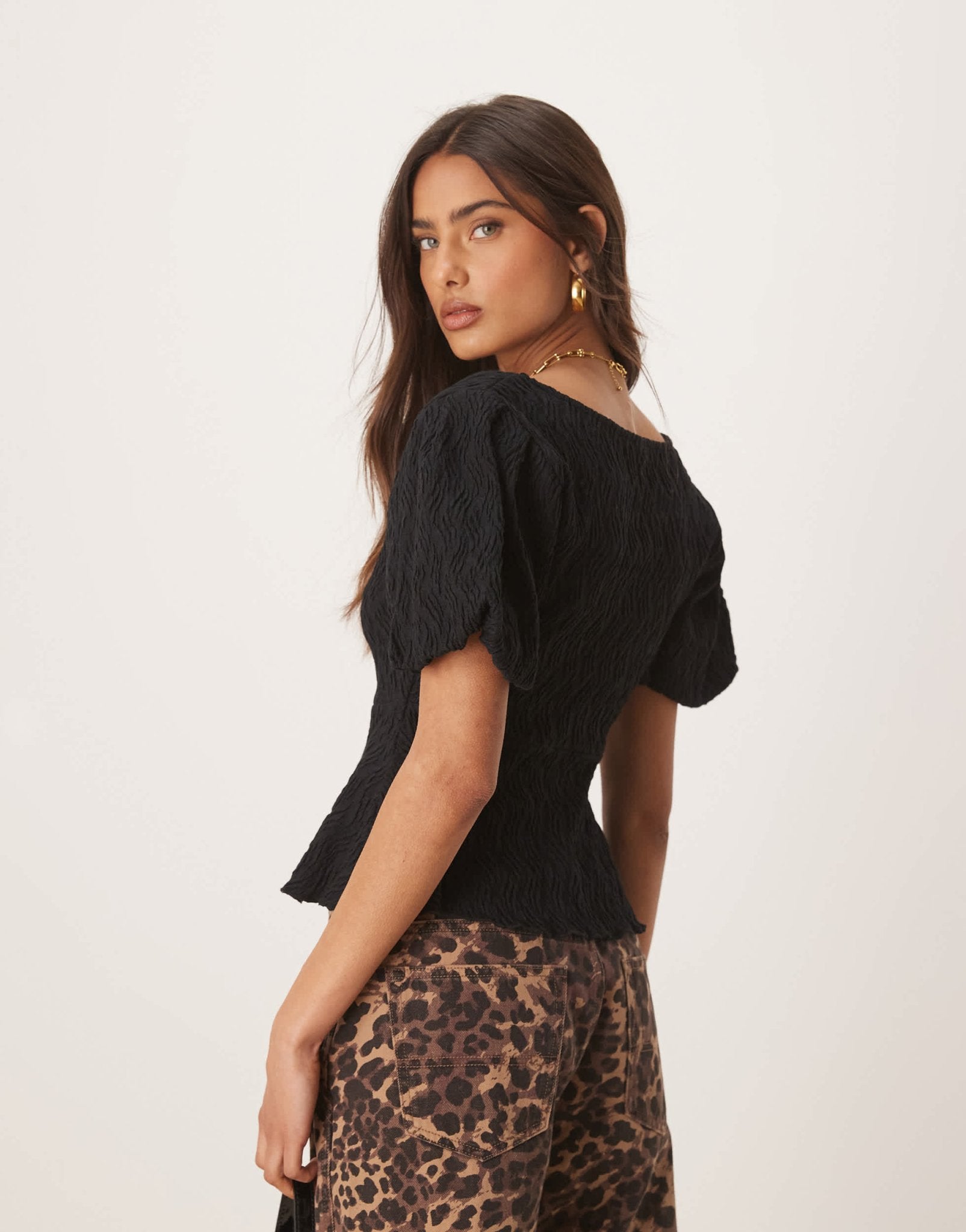 Gina Tricot wavy textured jersey with puff sleeves and peplum hem in black - ASOS Sample Sale
