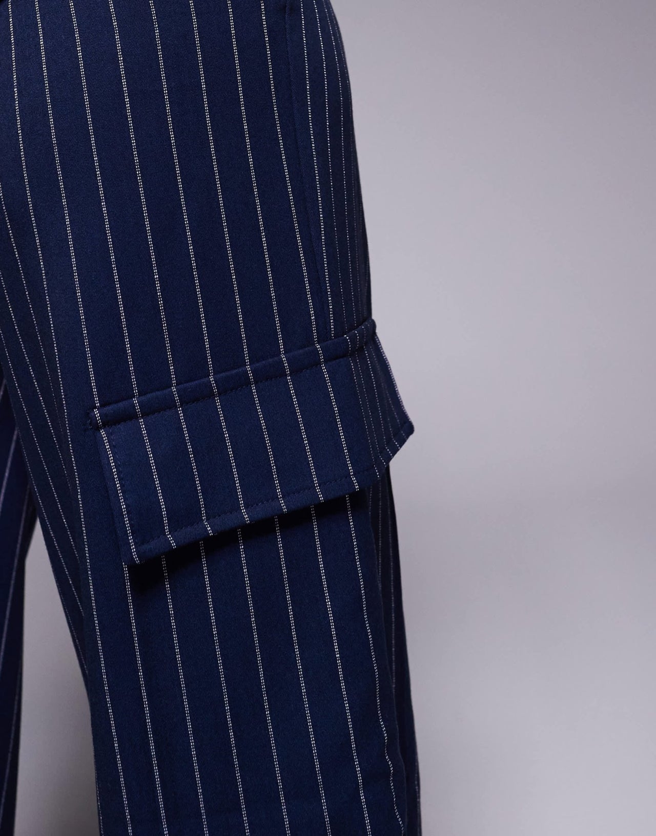 In The Style x Natalya Wright exclusive tailored wide leg pocket detail trousers co-ord in navy pinstripe - ASOS Sample Sale