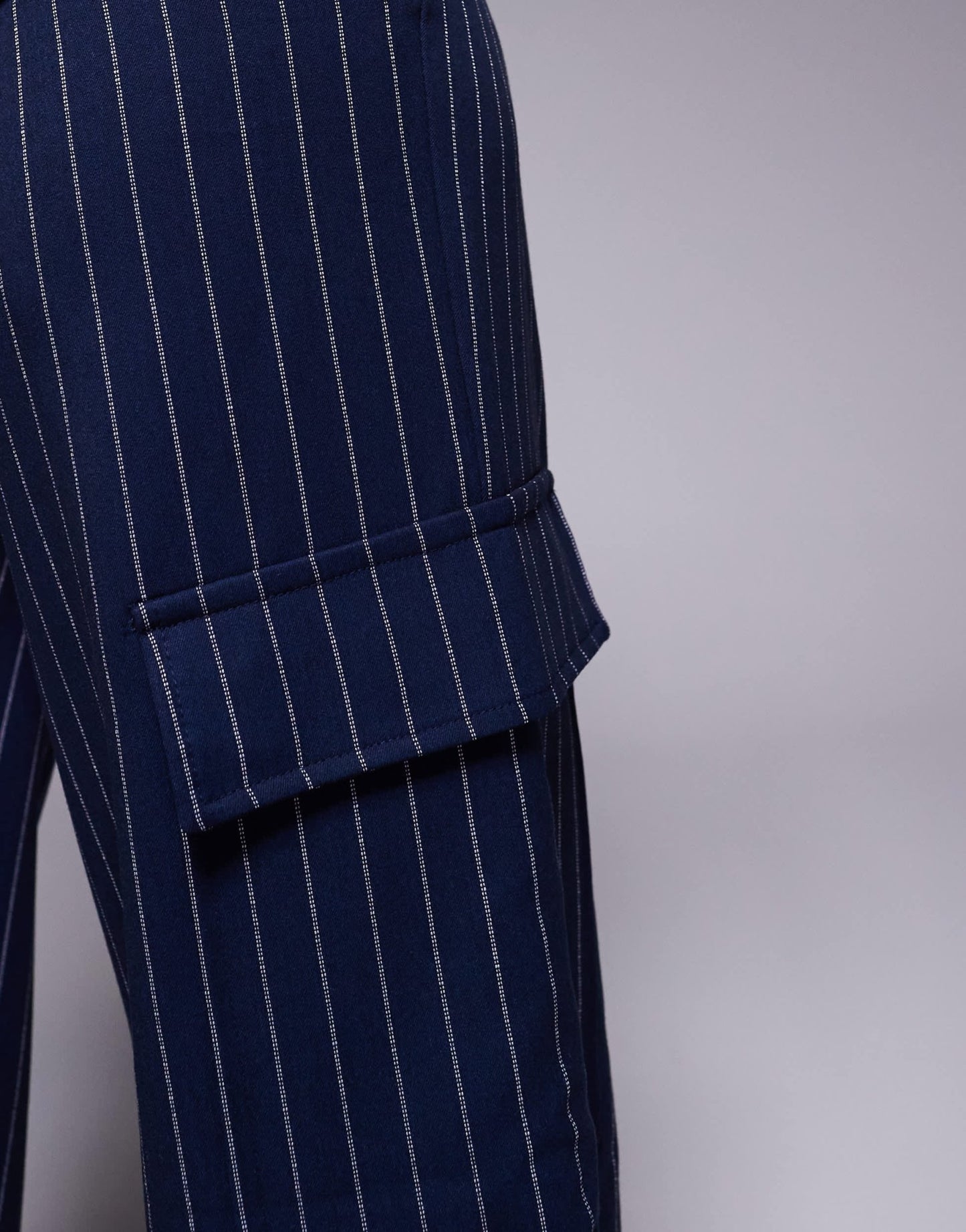 In The Style x Natalya Wright exclusive tailored wide leg pocket detail trousers co-ord in navy pinstripe - ASOS Sample Sale