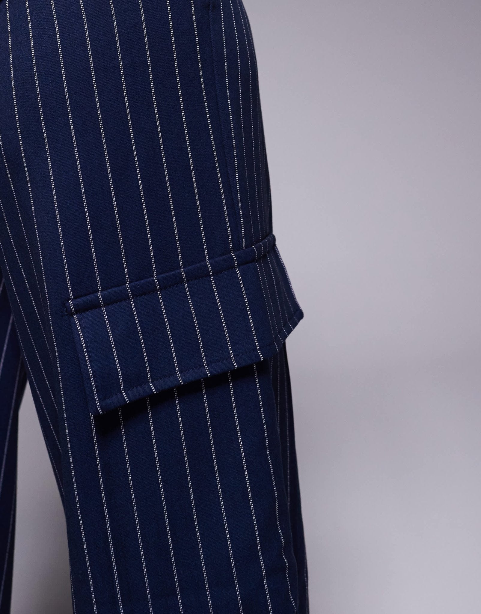 In The Style x Natalya Wright exclusive tailored wide leg pocket detail trousers co-ord in navy pinstripe - ASOS Sample Sale