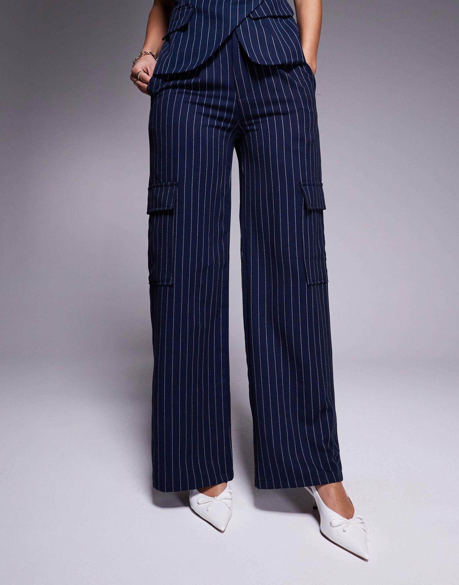 In The Style x Natalya Wright exclusive tailored wide leg pocket detail trousers co-ord in navy pinstripe - ASOS Sample Sale