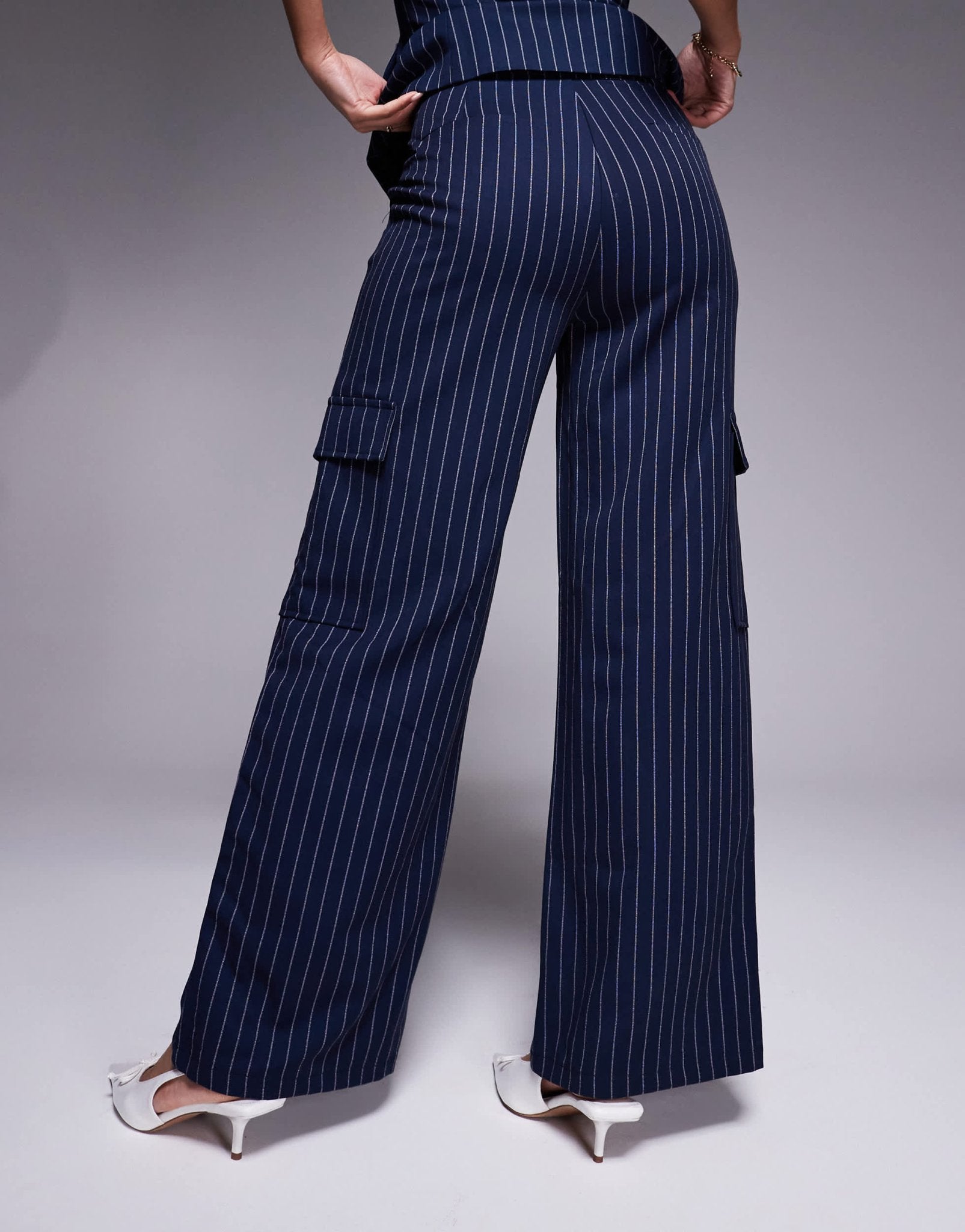 In The Style x Natalya Wright exclusive tailored wide leg pocket detail trousers co-ord in navy pinstripe - ASOS Sample Sale