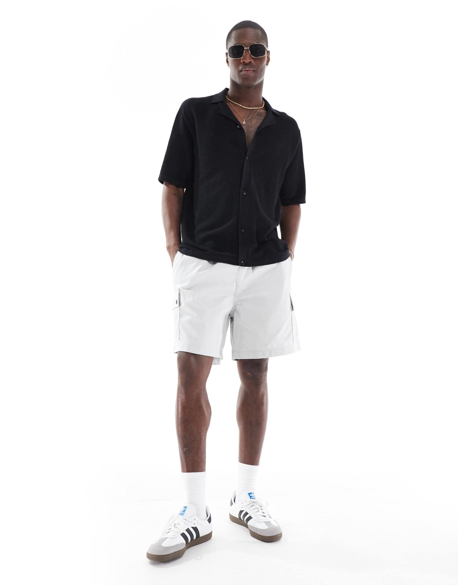 Jack & Jones oversized button through knitted polo in black - ASOS Sample Sale
