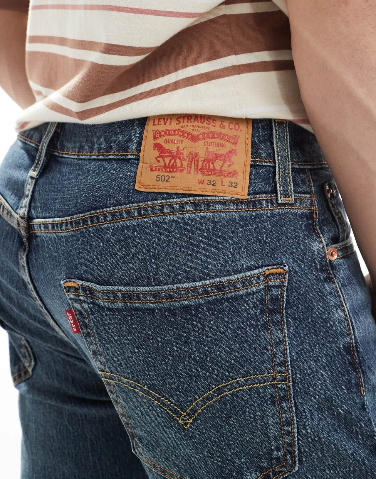 Levi's 502 tapered fit performance cool denim jeans in mid blue - ASOS Sample Sale