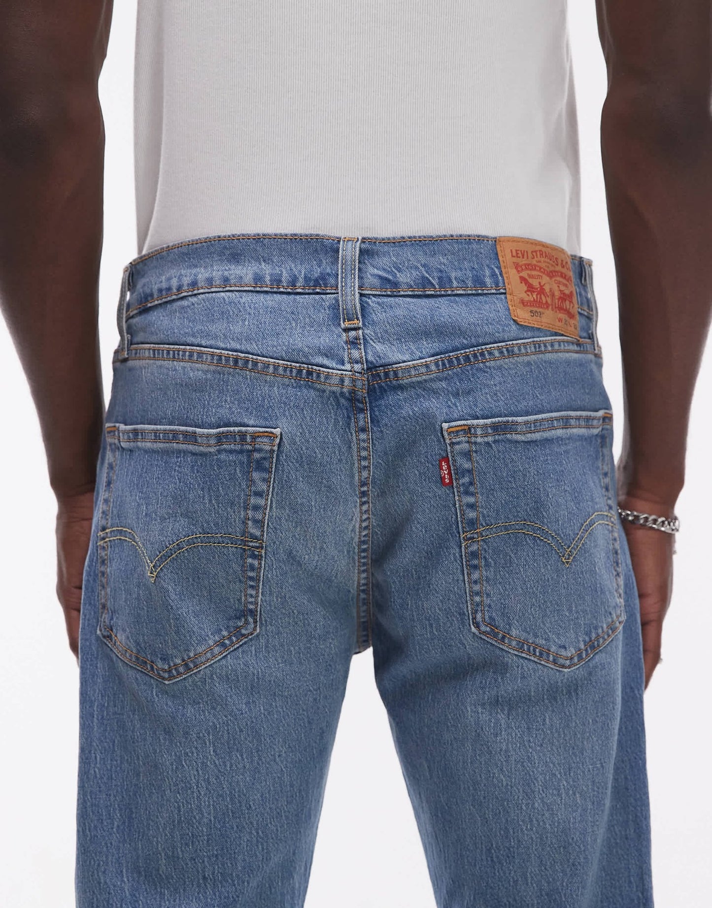 Levi's 502 tapered fit performance cool denim jeans in mid blue - ASOS Sample Sale