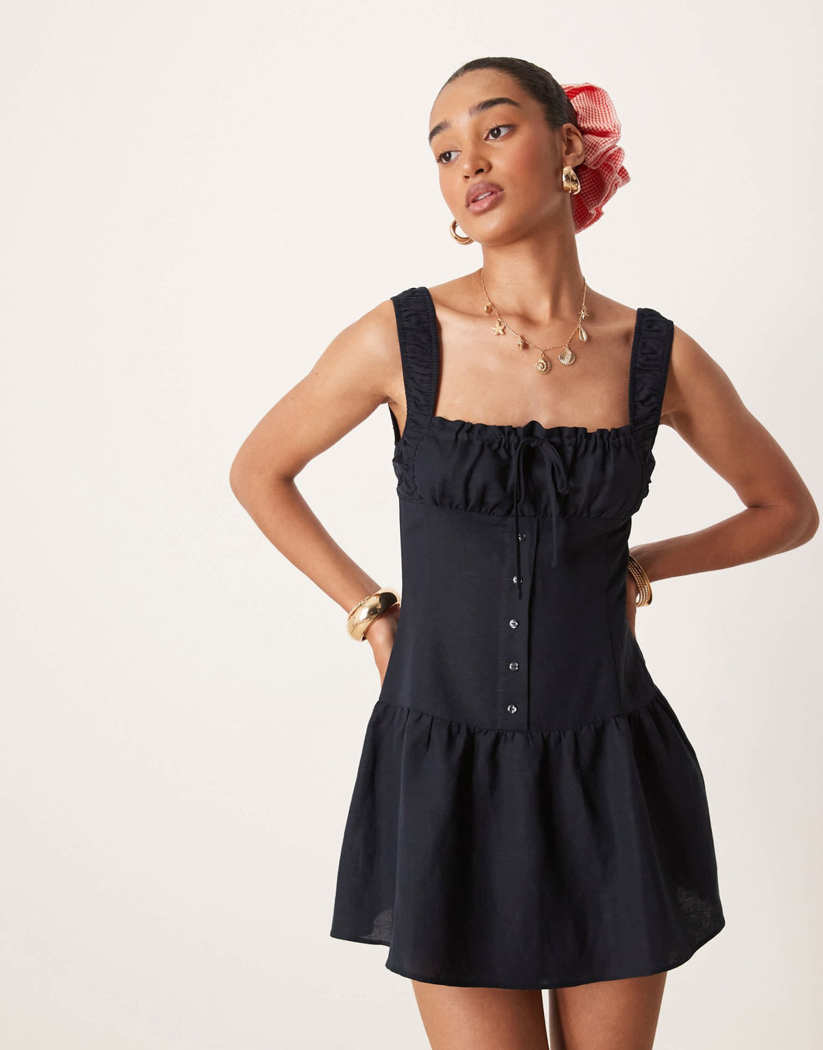 Lioness Heart Shaped linen blend milkmaid tie front button detail gathered skirt mini dress in navy - ASOS Sample Sale