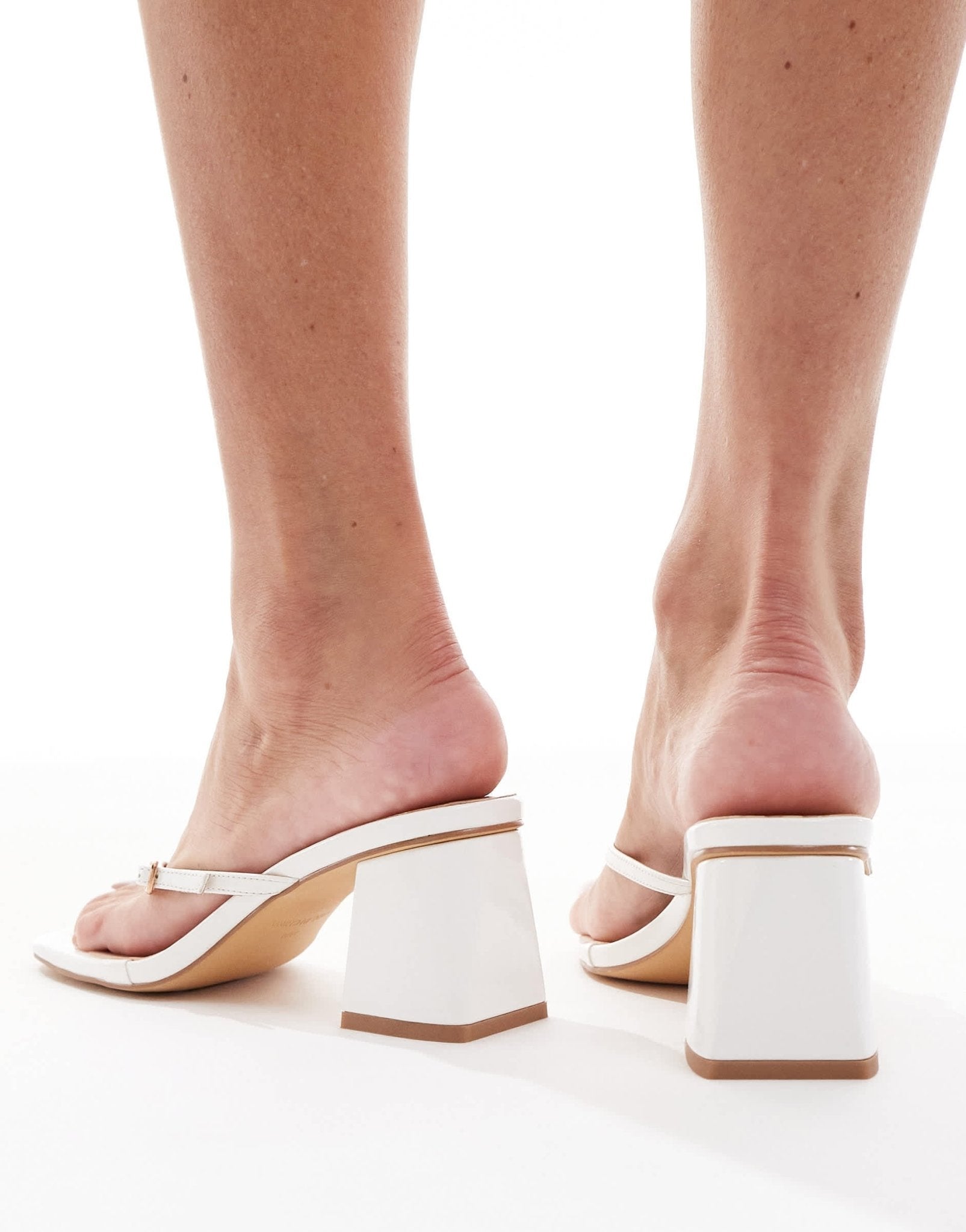 London Rebel buckle detail thong heeled sandals in white - ASOS Sample Sale