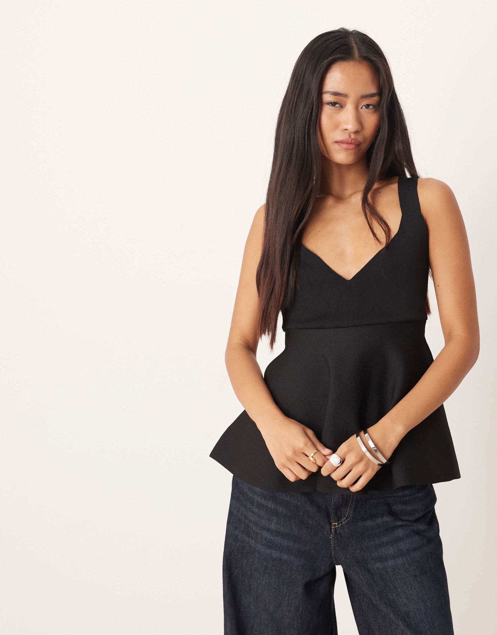 Mango structured v - neck knit peplum hem top in black - ASOS Sample Sale