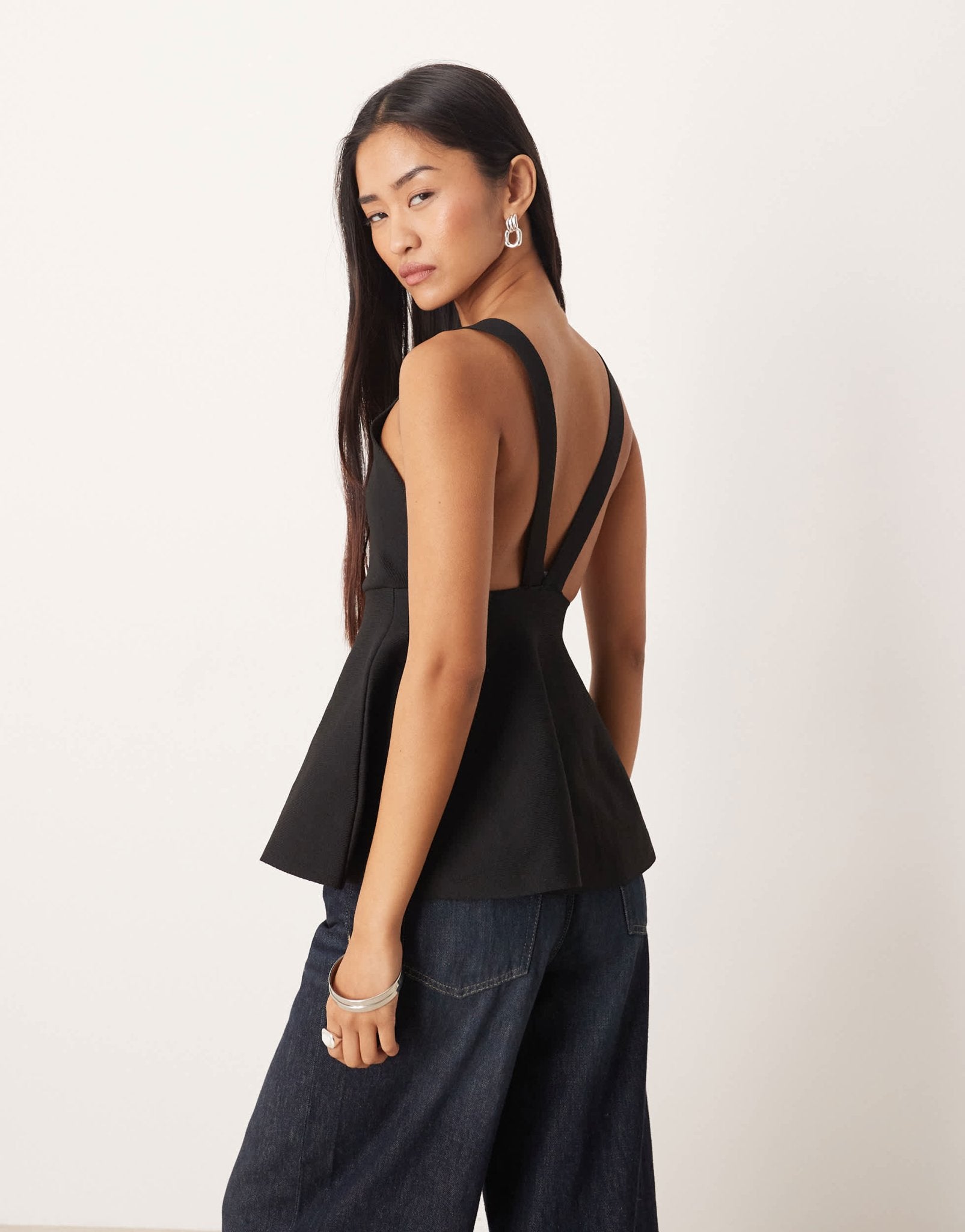 Mango structured v - neck knit peplum hem top in black - ASOS Sample Sale