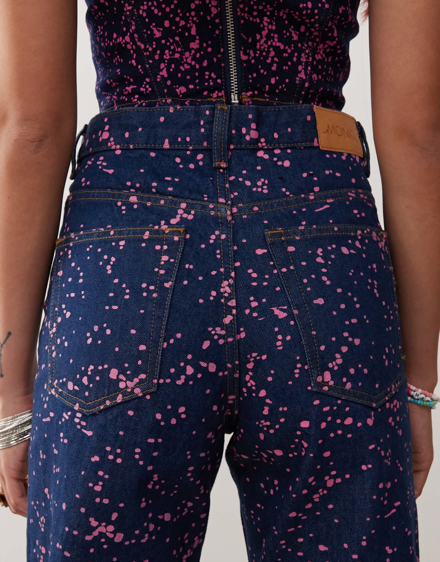 Monki co - ord Aimo straight leg jeans in dark blue with pink paint splatter print - ASOS Sample Sale