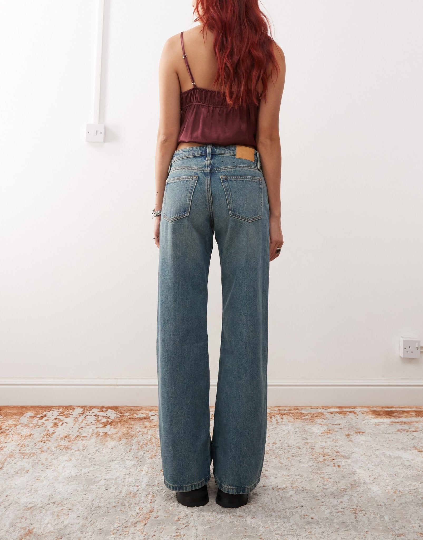 Monki Imoo low waisted wide fit jeans in mid blue wash - ASOS Sample Sale