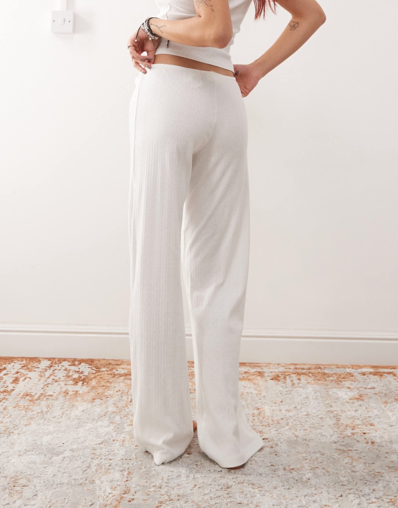 Monki mix and match pointelle lace pyjama bottoms with small bows in off white - ASOS Sample Sale