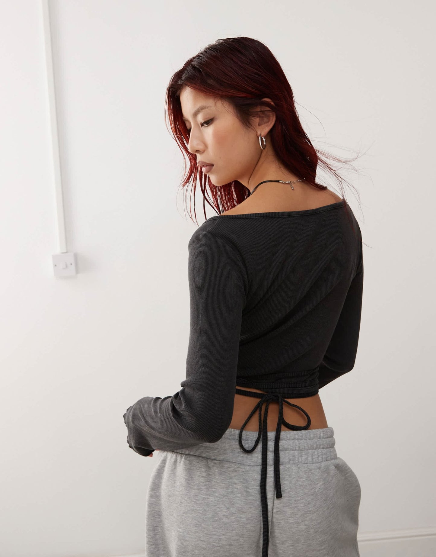 Monki wrapped rib yoga cardigan with tie details in washed black - ASOS Sample Sale