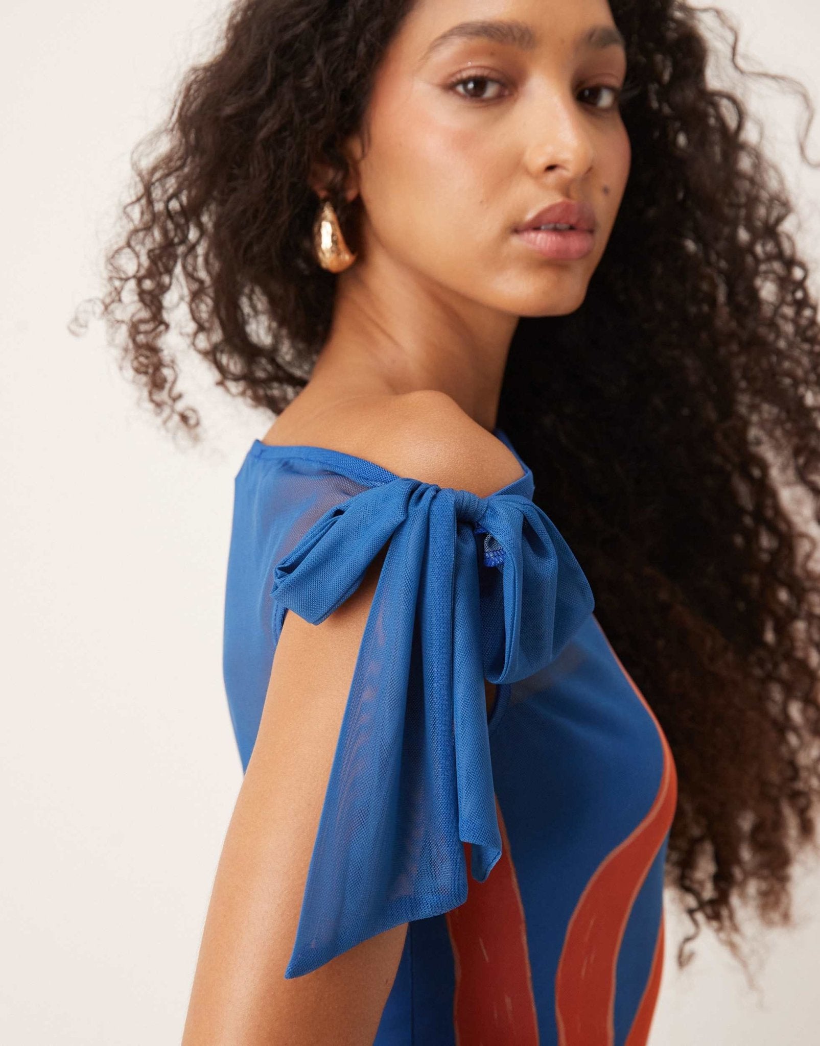 Never Fully Dressed asymmetric off shoulder maxi dress in blue sun print - ASOS Sample Sale