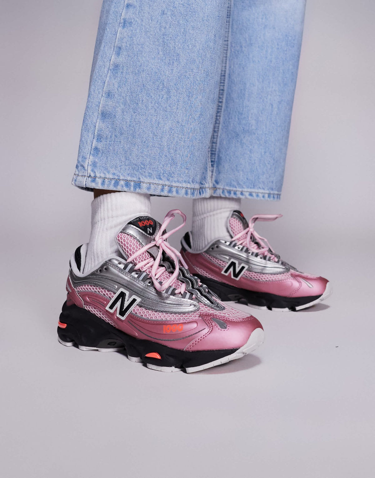 New Balance M1000 unisex trainers in pink and silver - ASOS Sample Sale
