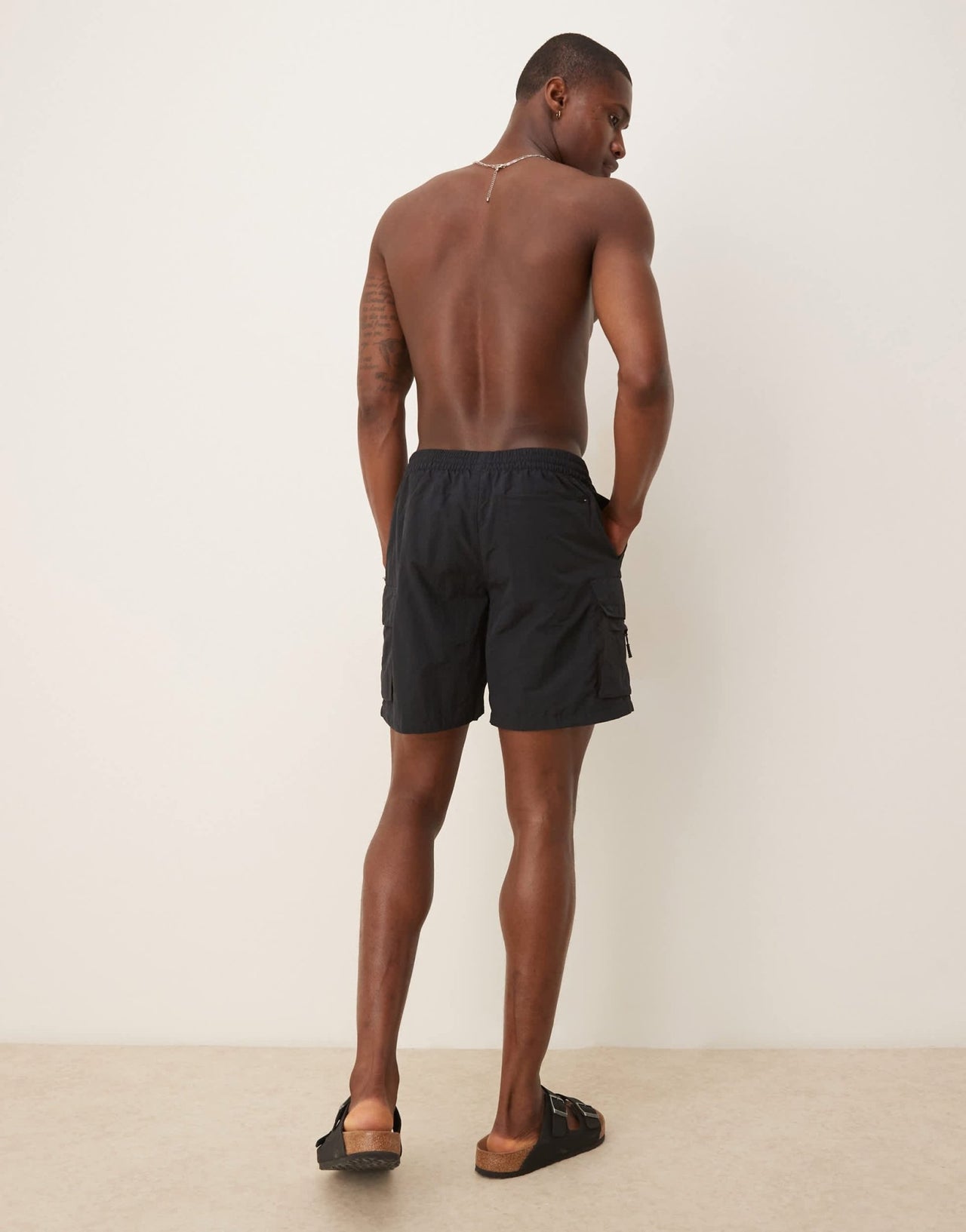 Nike 7 inch Volley multi pocket swim shorts in black - ASOS Sample Sale